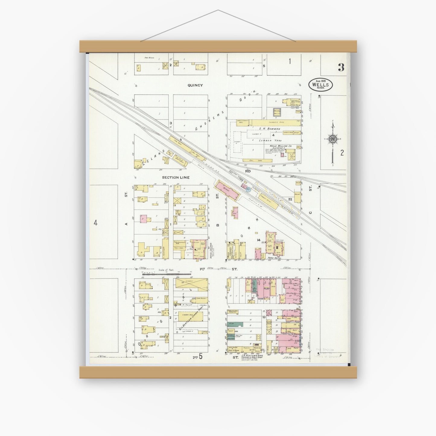 Old map wall art mockup — magnetic wood frame on white wall — Sanborn Fire Insurance Map from Wells, Faribault County, Minnesota (1909), Sheet #0003