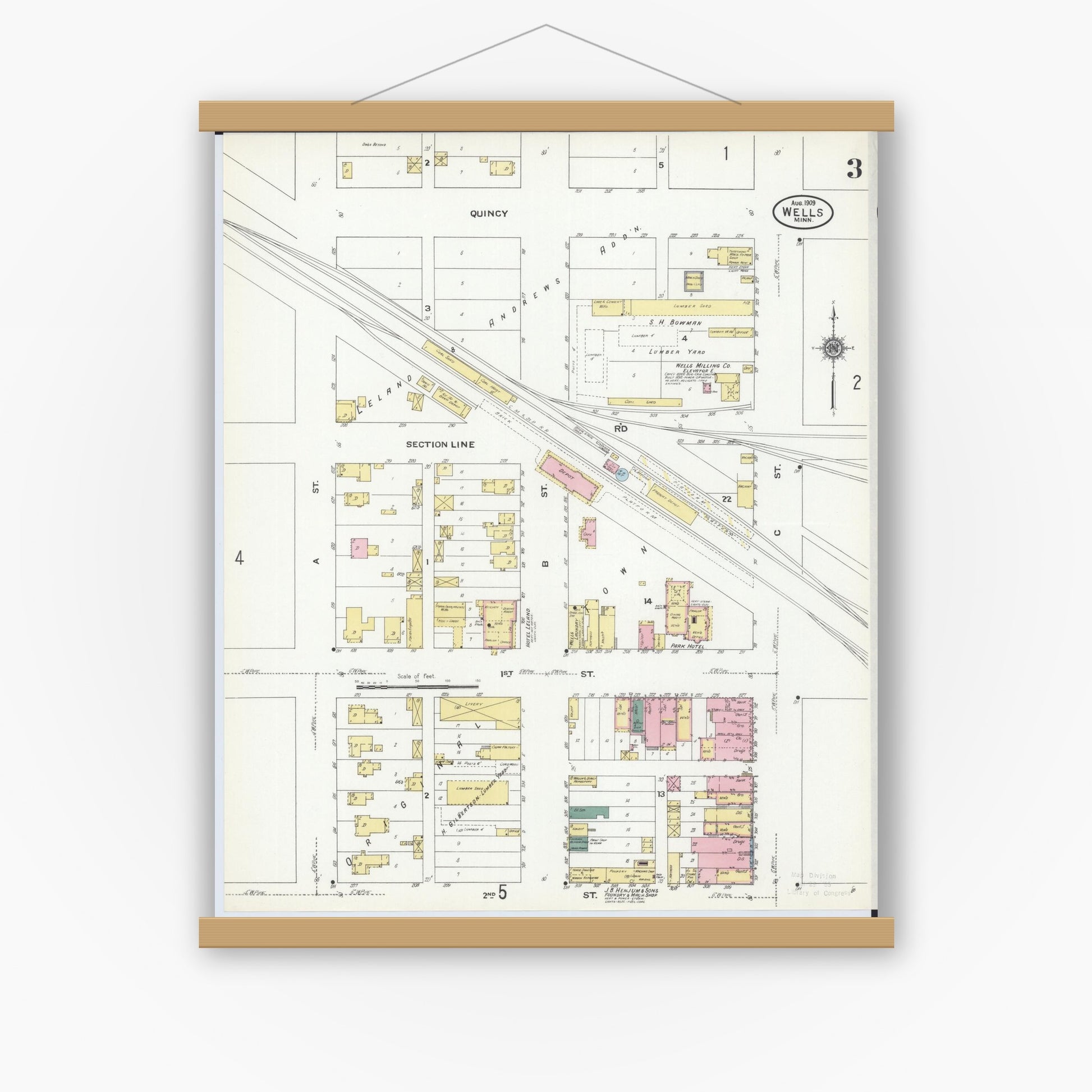 Old map wall art mockup — magnetic wood frame on white wall — Sanborn Fire Insurance Map from Wells, Faribault County, Minnesota (1909), Sheet #0003