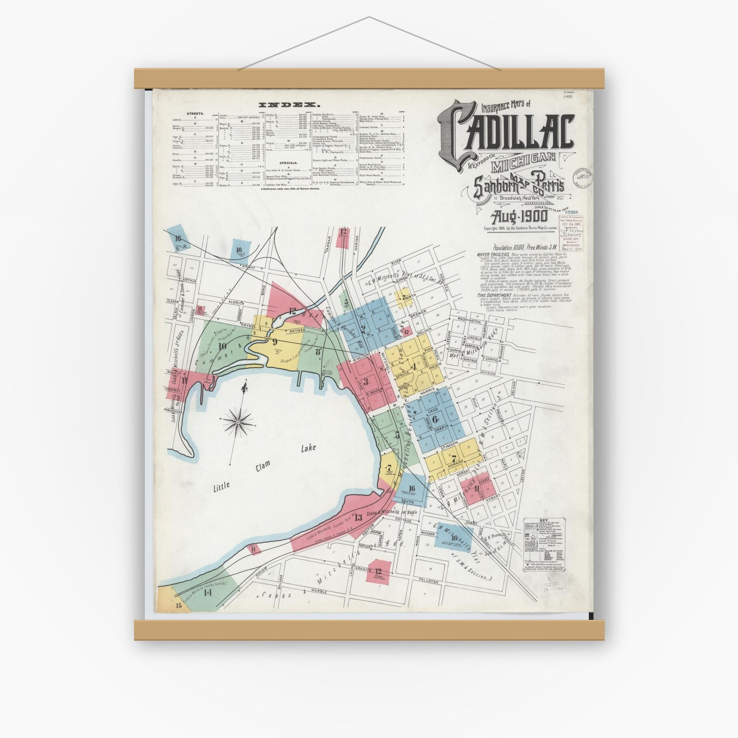 Old map wall art mockup — magnetic wood frame on white wall — Sanborn Fire Insurance Map from Cadillac, Wexford County, Michigan (1900) - Complete Map Set