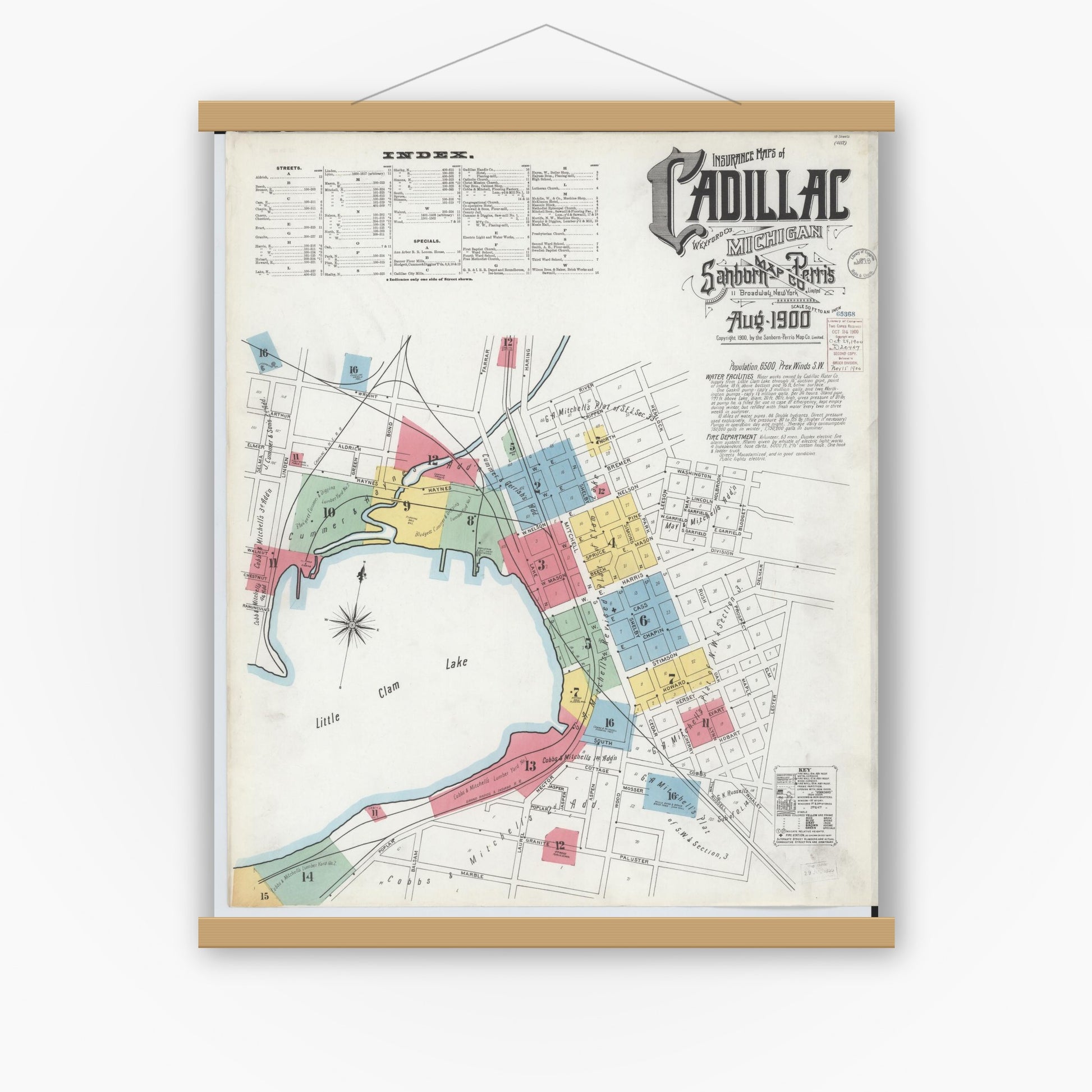Old map wall art mockup — magnetic wood frame on white wall — Sanborn Fire Insurance Map from Cadillac, Wexford County, Michigan (1900) - Complete Map Set