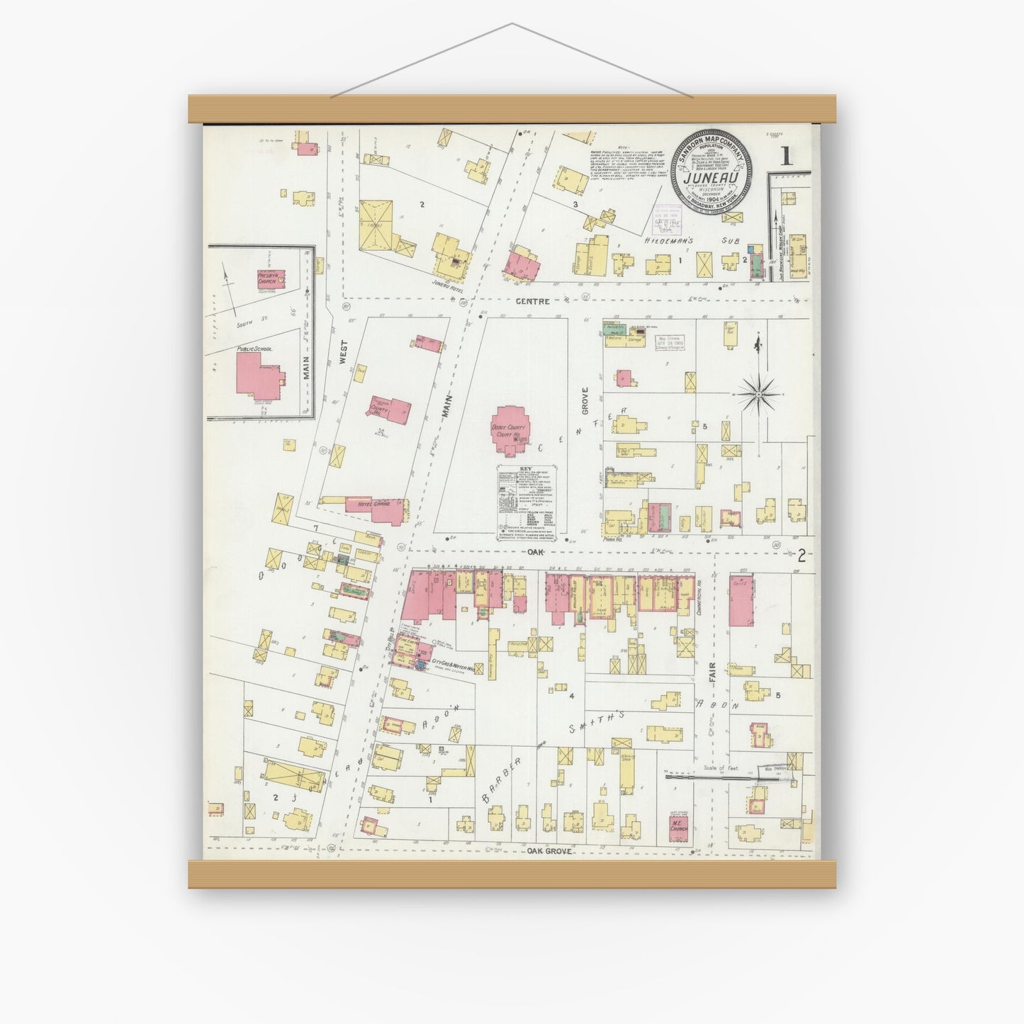 Old map wall art mockup — magnetic wood frame on white wall — Sanborn Fire Insurance Map from Juneau, Dodge County, Wisconsin (1904), Sheet #0001
