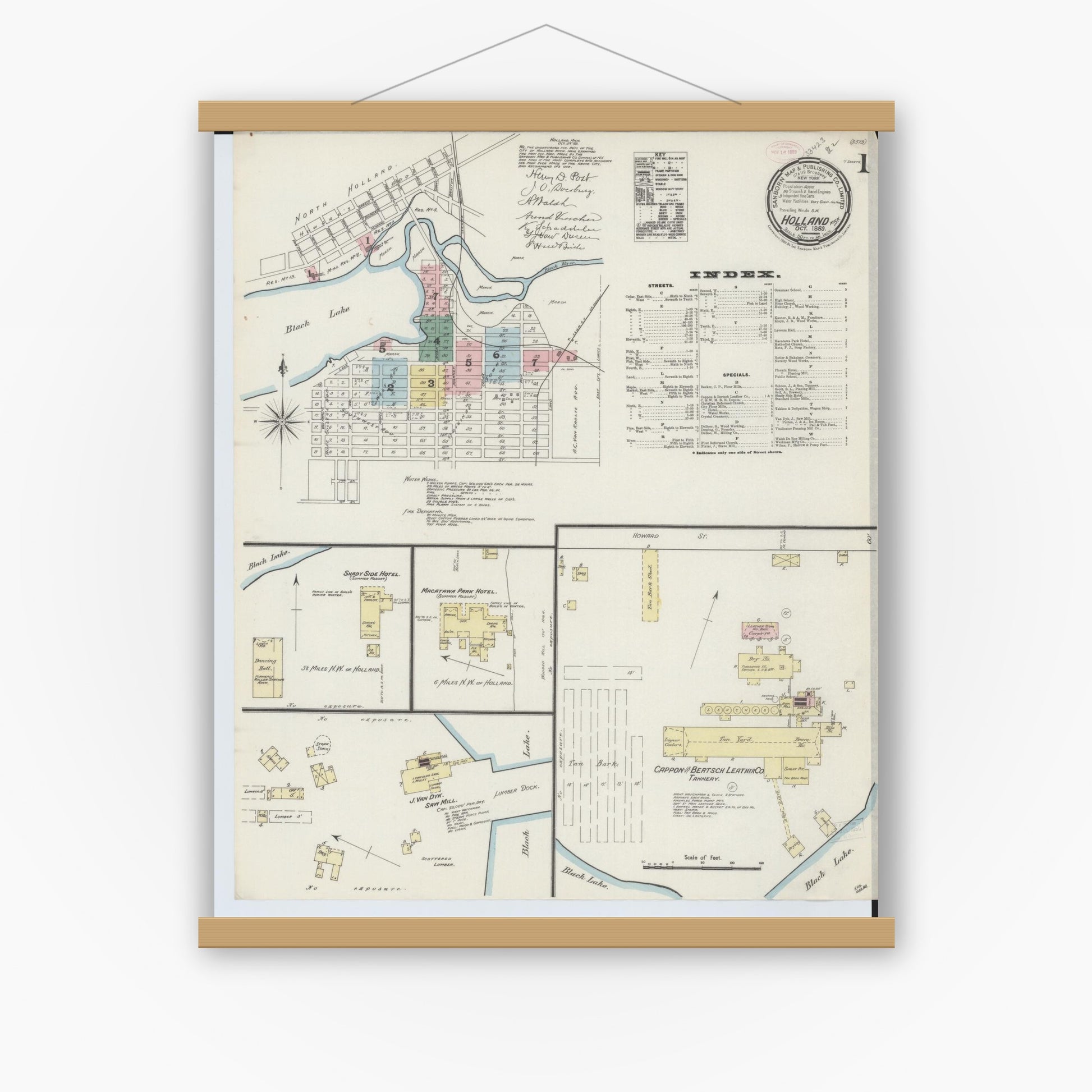 Old map wall art mockup — magnetic wood frame on white wall — Sanborn Fire Insurance Map from Holland, Ottawa County, Michigan (1889) - Complete Map Set