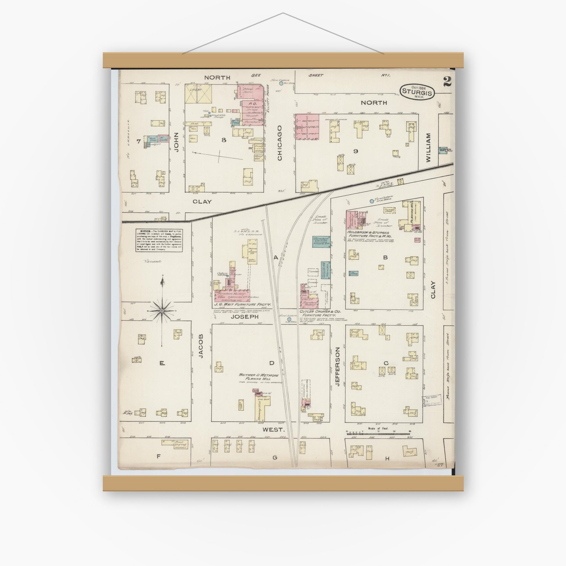 Old map wall art mockup — magnetic wood frame on white wall — Sanborn Fire Insurance Map from Sturgis, Saint Joseph County, Michigan (1884), Sheet #0002