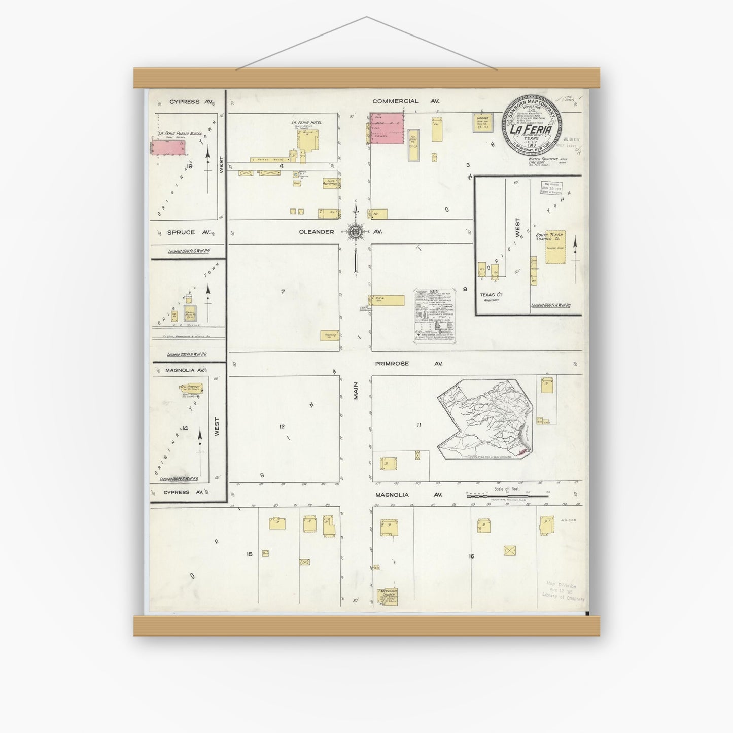 Old map wall art mockup — magnetic wood frame on white wall — Sanborn Fire Insurance Map from La Feria, Cameron County, Texas (1917), Sheet #0001