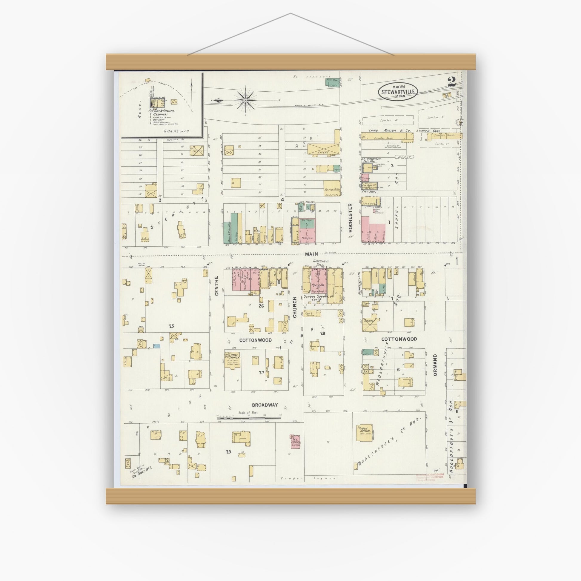 Old map wall art mockup — magnetic wood frame on white wall — Sanborn Fire Insurance Map from Stewartville, Olmsted County, Minnesota (1899), Sheet #0002