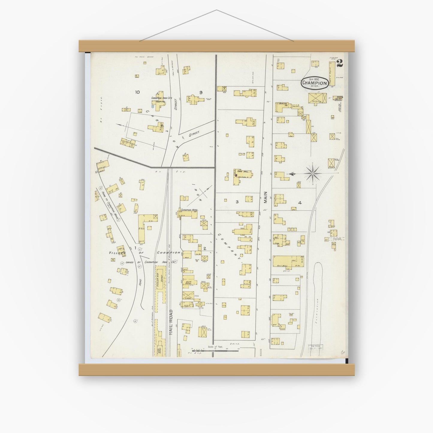 Old map wall art mockup — magnetic wood frame on white wall — Sanborn Fire Insurance Map from Champion, Marquette County, Michigan (1892), Sheet #0002