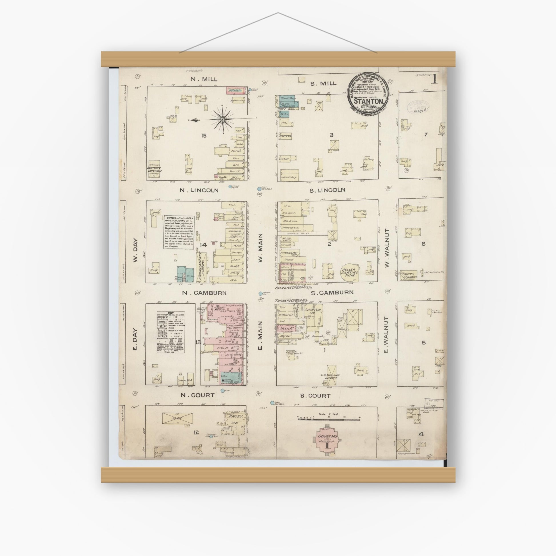 Old map wall art mockup — magnetic wood frame on white wall — Sanborn Fire Insurance Map from Stanton, Montcalm County, Michigan (1884) - Complete Map Set