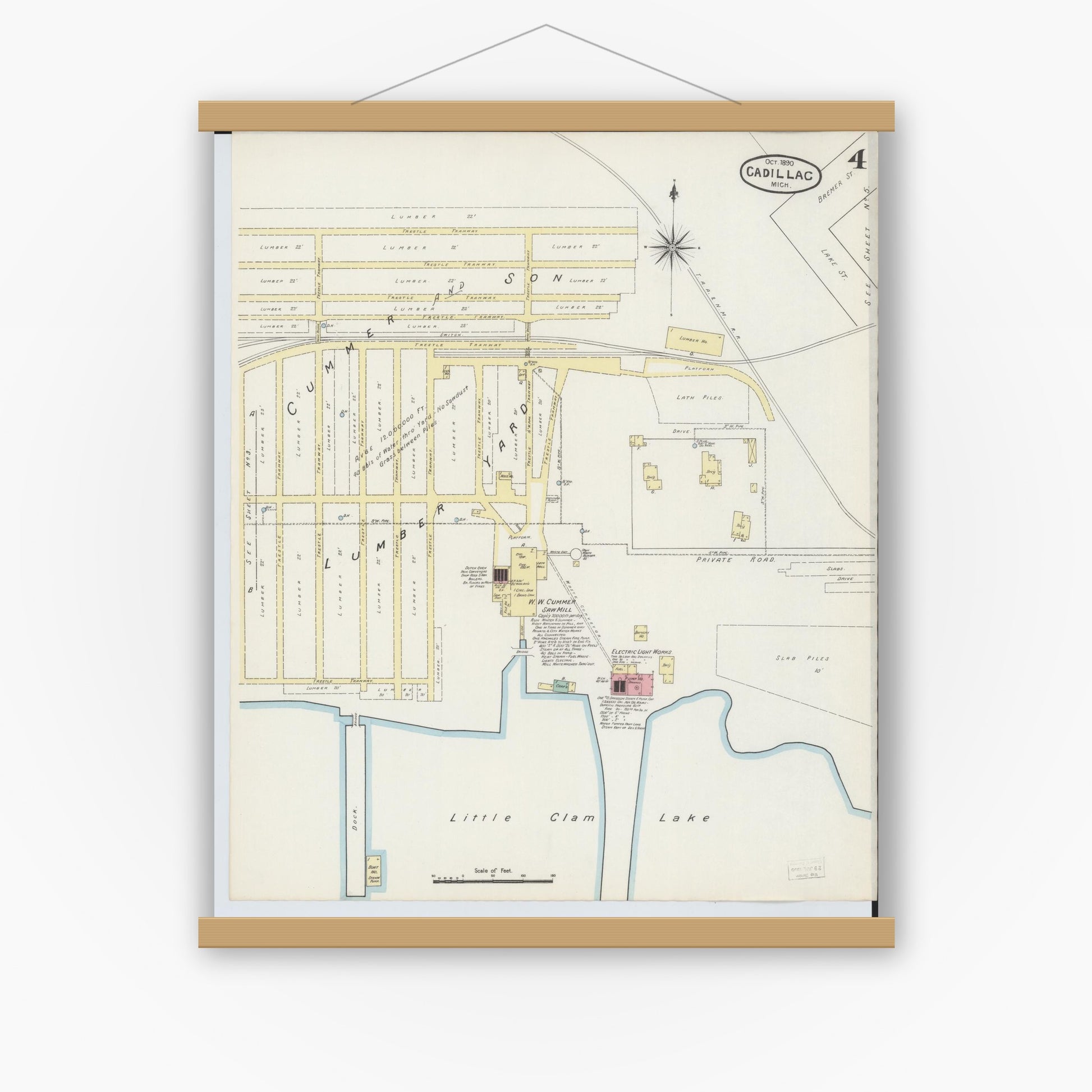 Old map wall art mockup — magnetic wood frame on white wall — Sanborn Fire Insurance Map from Cadillac, Wexford County, Michigan (1890), Sheet #0004