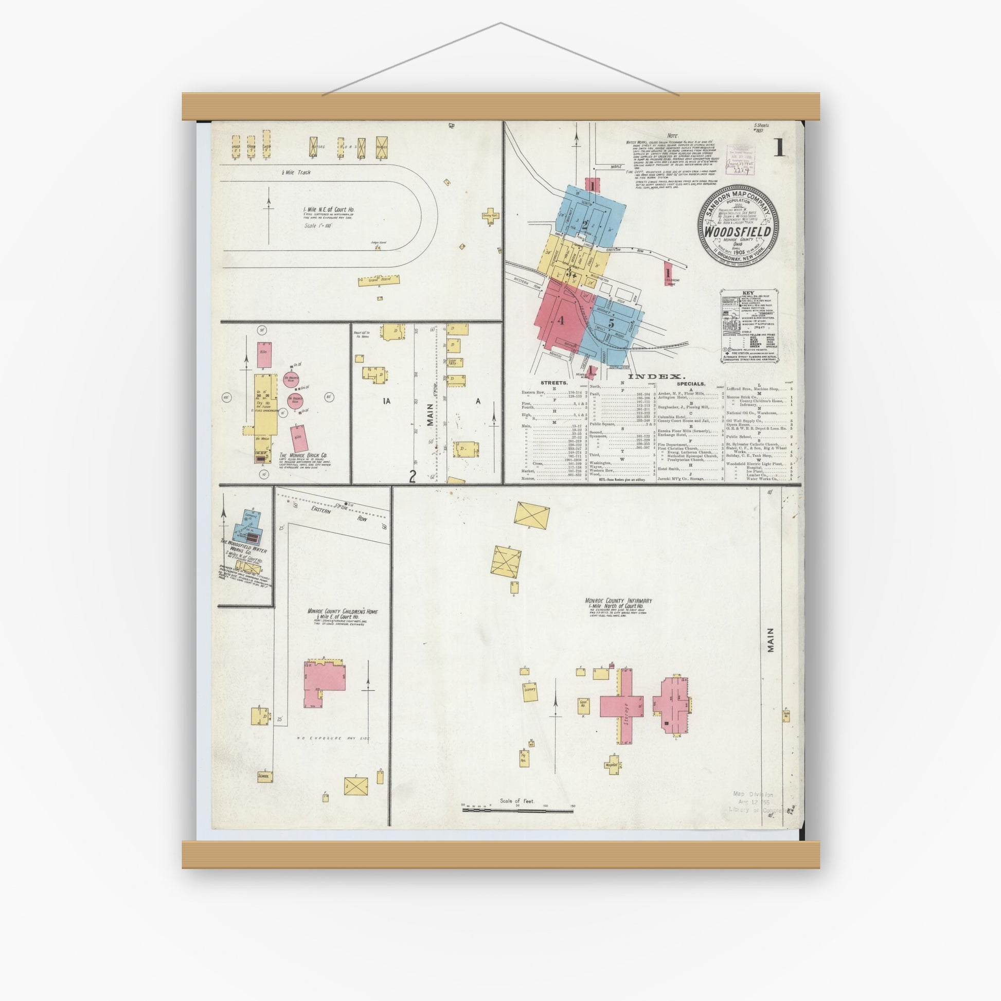 Old map wall art mockup — magnetic wood frame on white wall — Sanborn Fire Insurance Map from Woodsfield, Monroe County, Ohio (1905), Sheet #0001