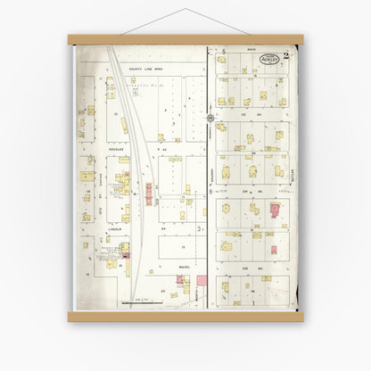 Old map wall art mockup — magnetic wood frame on white wall — Sanborn Fire Insurance Map from Ackley, Hardin and Franklin Counties, Iowa (1916), Sheet #0002