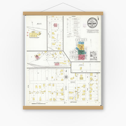 Old map wall art mockup — magnetic wood frame on white wall — Sanborn Fire Insurance Map from What Cheer, Keokuk County, Iowa (1906), Sheet #0001