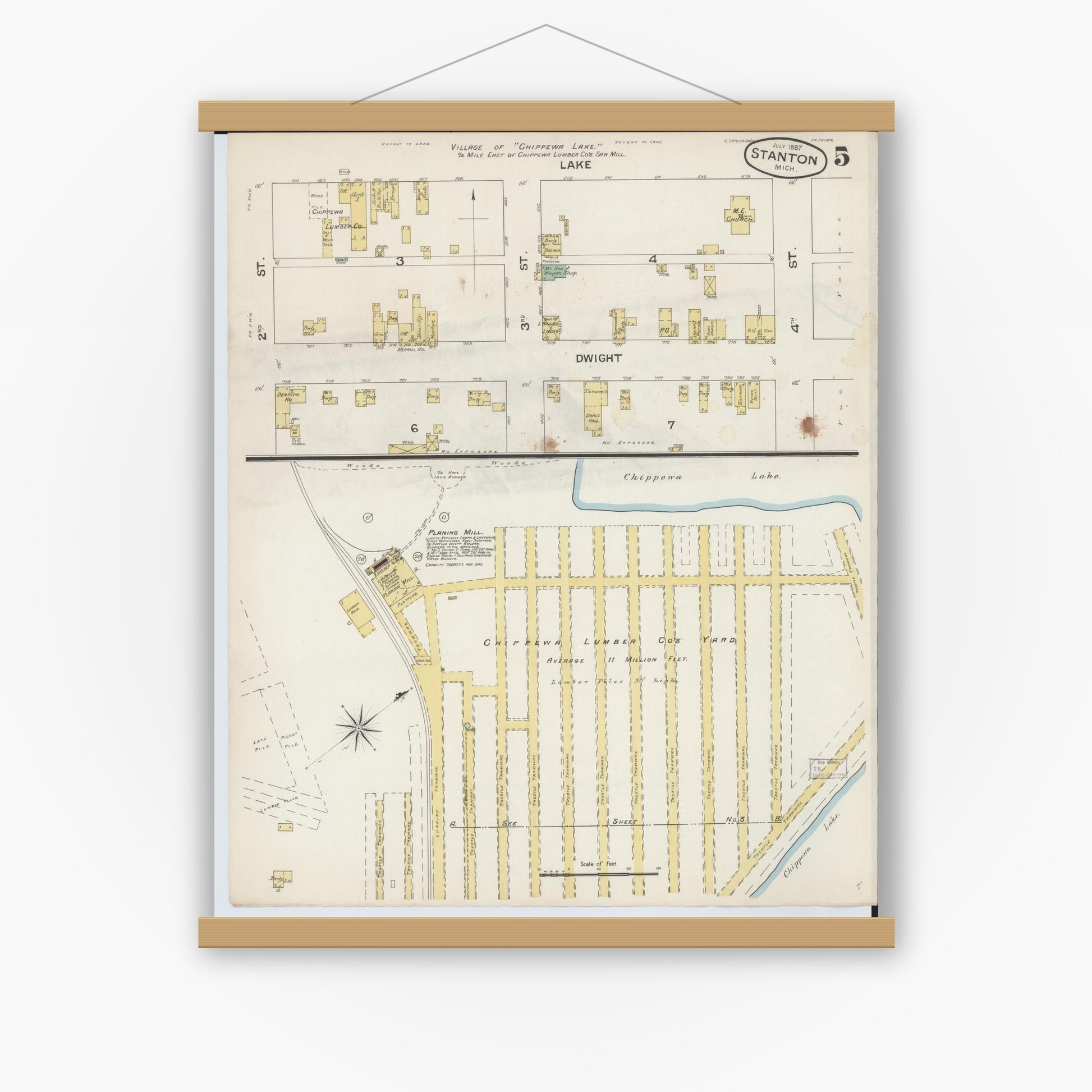 Old map wall art mockup — magnetic wood frame on white wall — Sanborn Fire Insurance Map from Stanton, Montcalm County, Michigan (1887), Sheet #0005