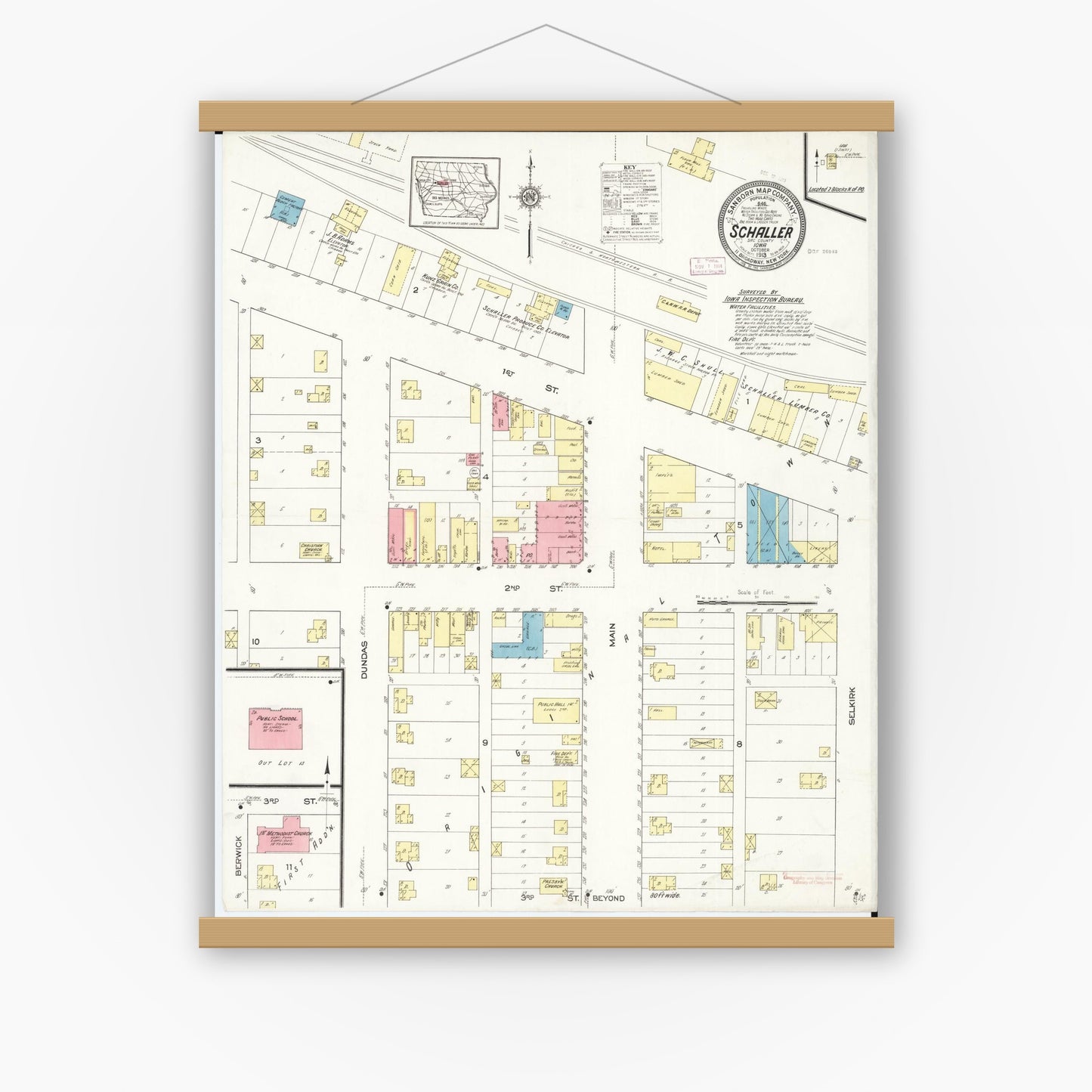 Old map wall art mockup — magnetic wood frame on white wall — Sanborn Fire Insurance Map from Schaller, Sac County, Iowa (1913), Sheet #0001