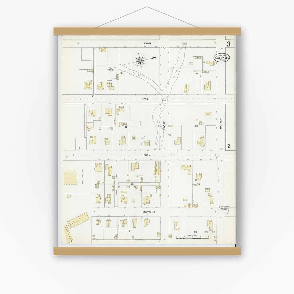 Old map wall art mockup — magnetic wood frame on white wall — Sanborn Fire Insurance Map from Caldwell, Burleson County, Texas (1906), Sheet #0003