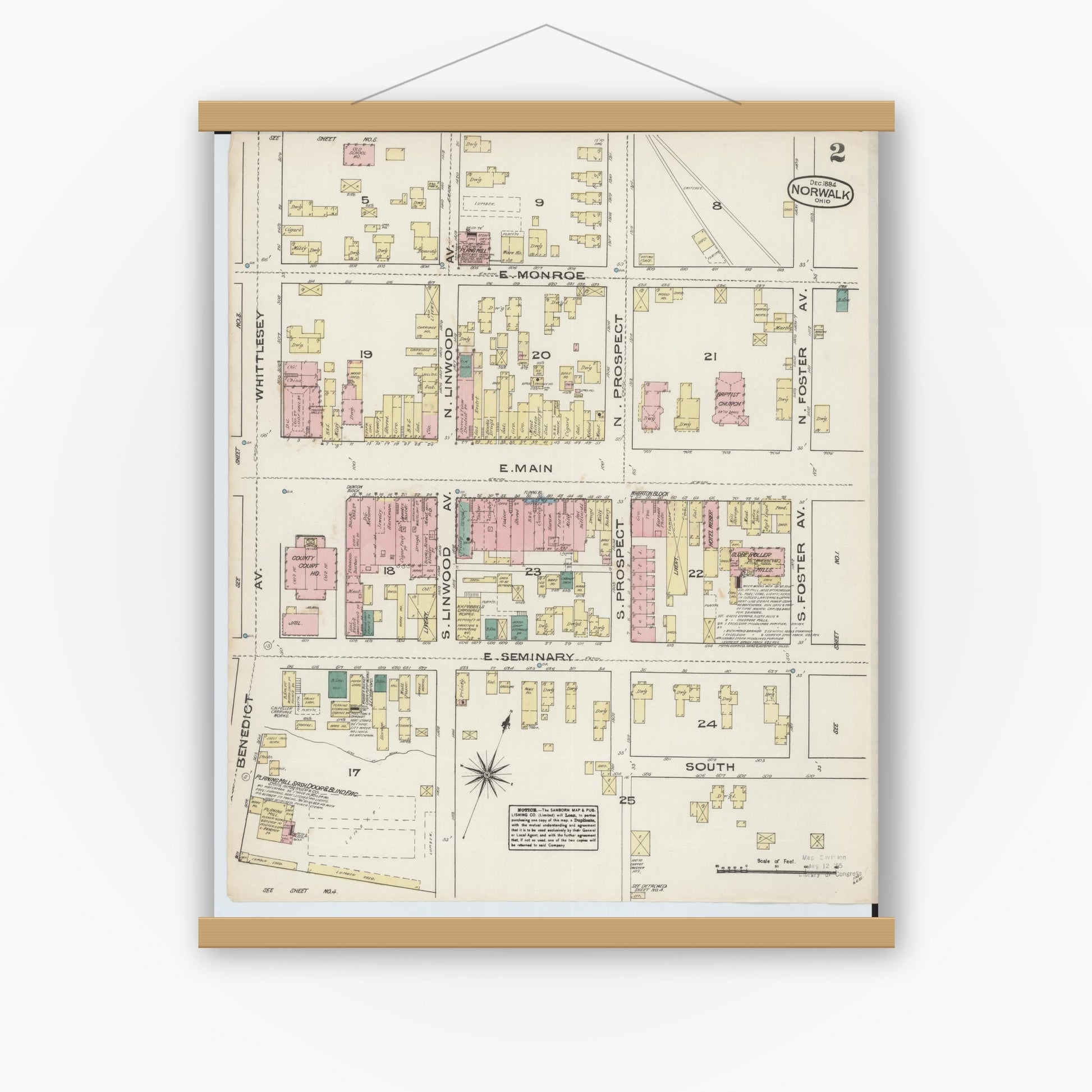 Old map wall art mockup — magnetic wood frame on white wall — Sanborn Fire Insurance Map from Norwalk, Huron County, Ohio (1884), Sheet #0002