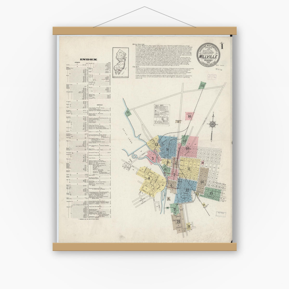 Old map wall art mockup — magnetic wood frame on white wall — Sanborn Fire Insurance Map from Millville, Cumberland County, New Jersey (1915), Sheet #0001