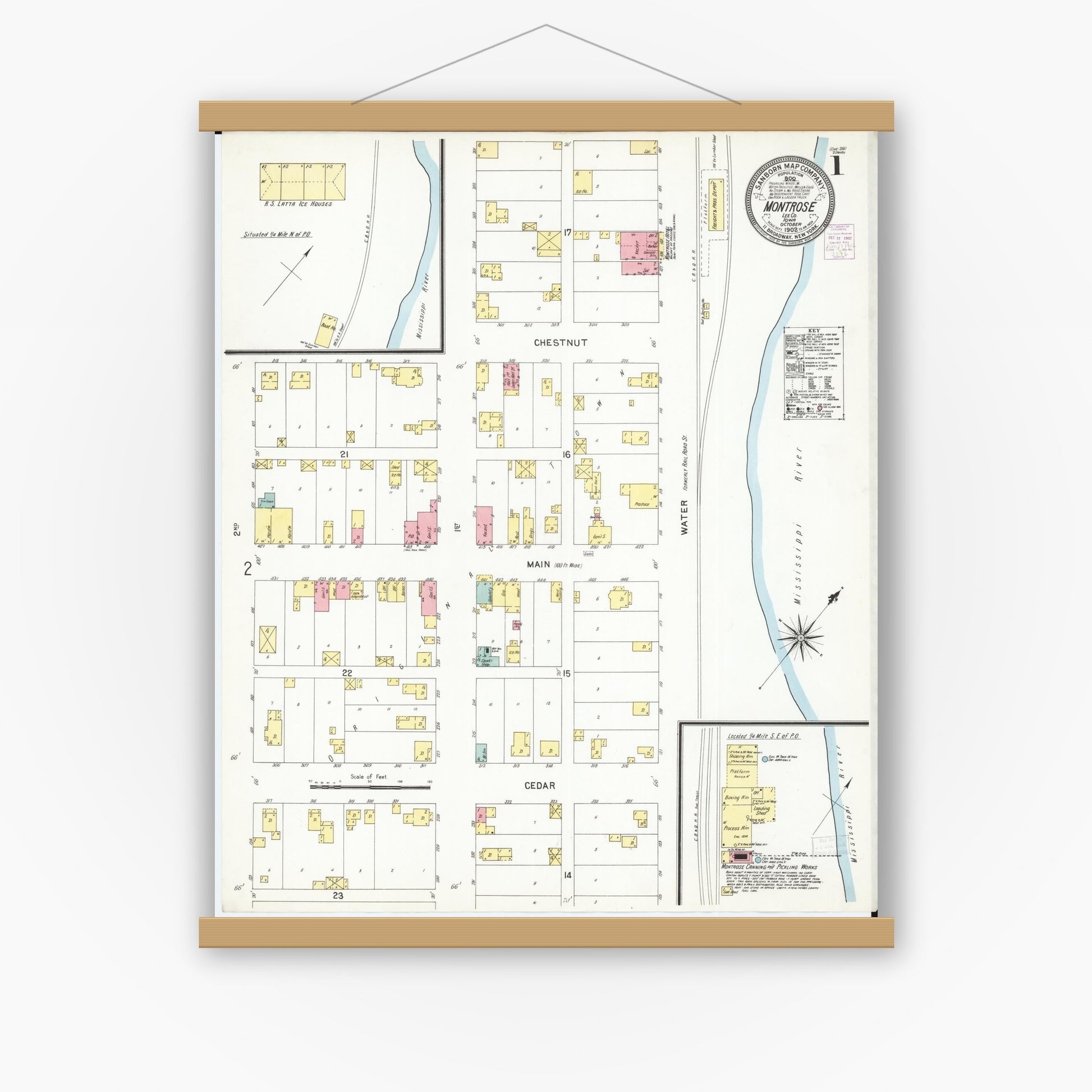 Old map wall art mockup — magnetic wood frame on white wall — Sanborn Fire Insurance Map from Montrose, Lee County, Iowa (1902) â€” Complete Set