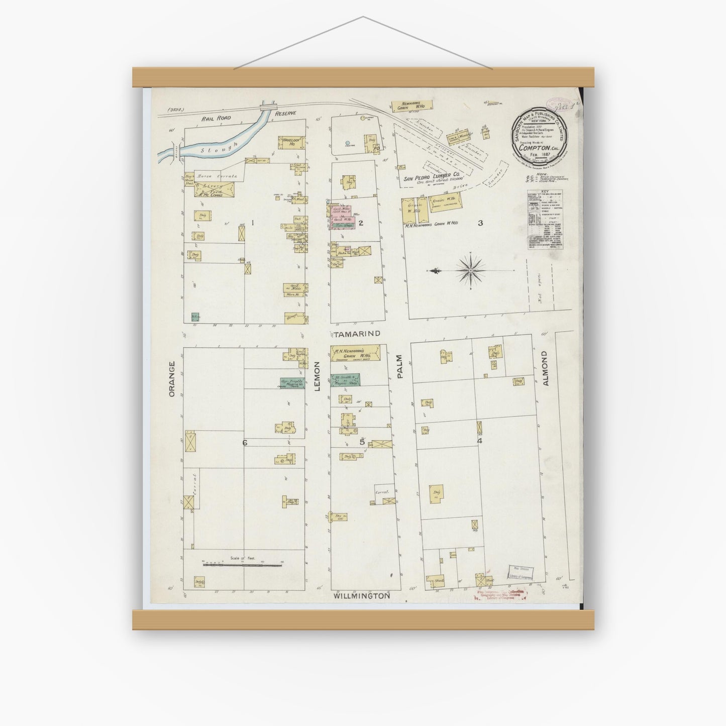 Old map wall art mockup — magnetic wood frame on white wall — Sanborn Fire Insurance Map from Compton, Los Angeles County, California (1887), Sheet #0001