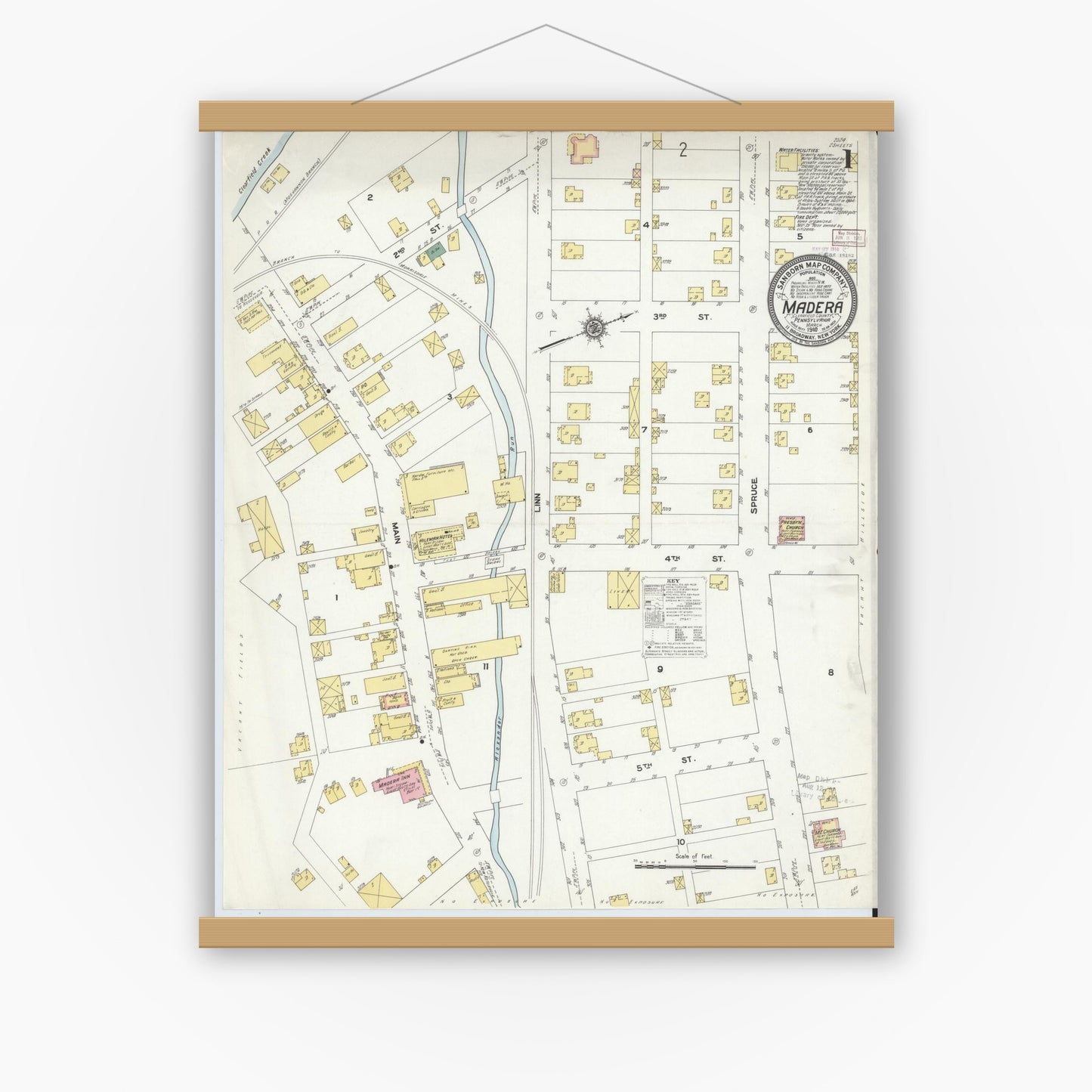 Old map wall art mockup — magnetic wood frame on white wall — Sanborn Fire Insurance Map from Madera, Clearfield County, Pennsylvania (1910), Sheet #0001