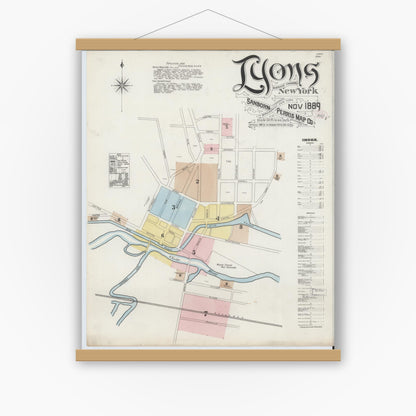 Old map wall art mockup — magnetic wood frame on white wall — Sanborn Fire Insurance Map from Lyons, Wayne County, New York (1889) - Complete Map Set