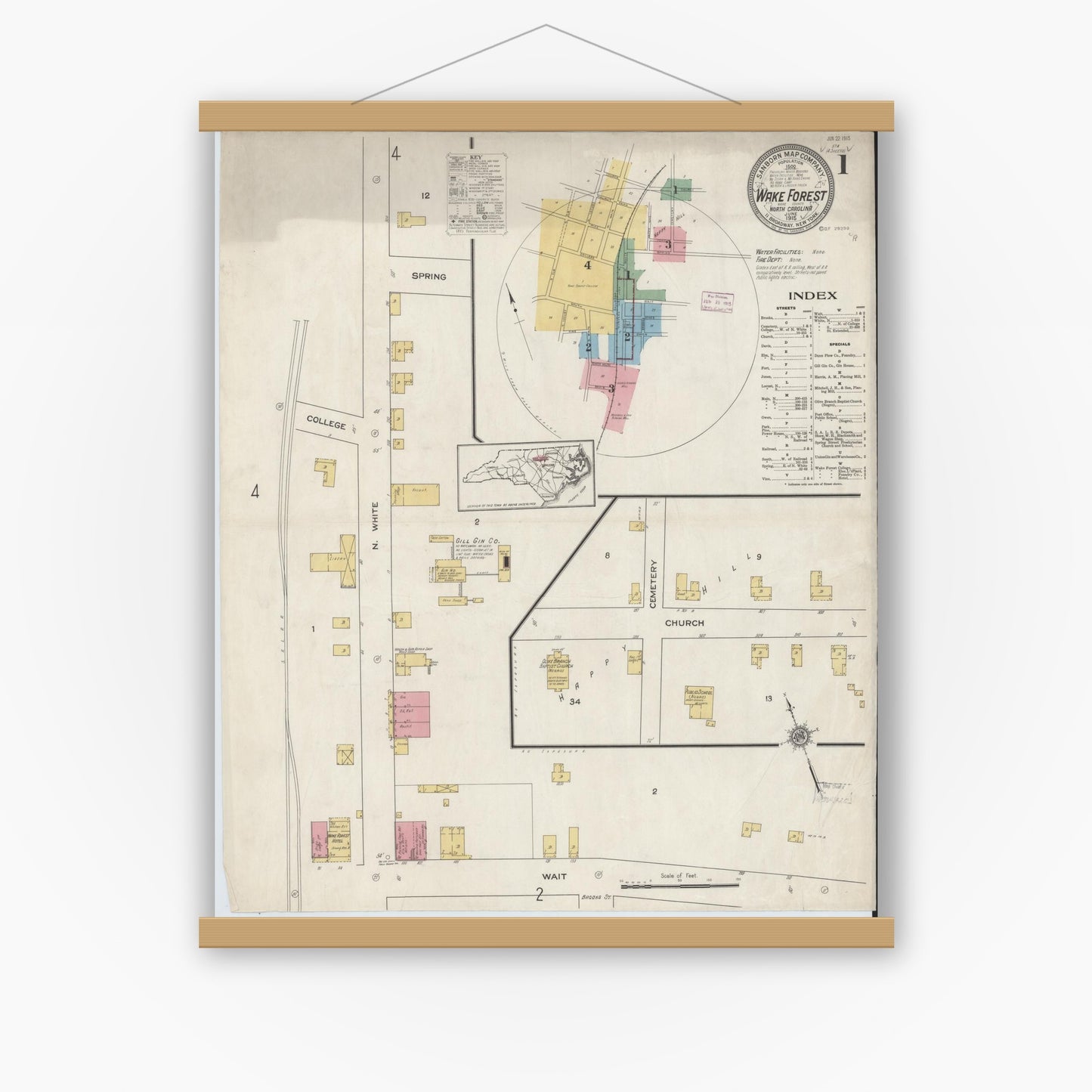 Old map wall art mockup — magnetic wood frame on white wall — Sanborn Fire Insurance Map from Wake Forest, Wake County, North Carolina (1915) - Complete Map Set