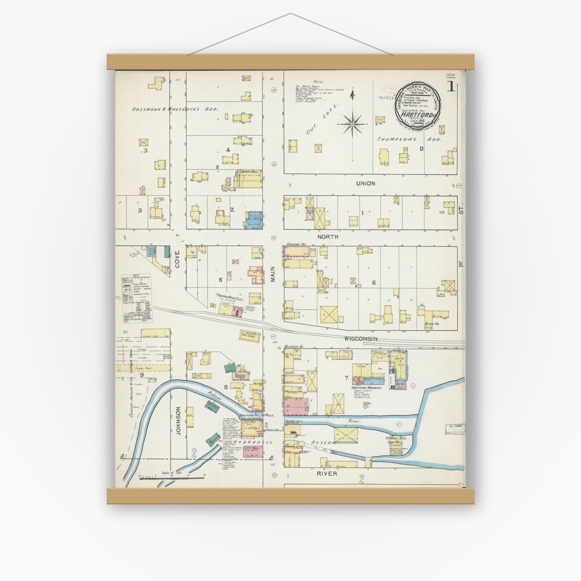 Old map wall art mockup — magnetic wood frame on white wall — Sanborn Fire Insurance Map from Hartford, Washington County, Wisconsin (1892), Sheet #0001