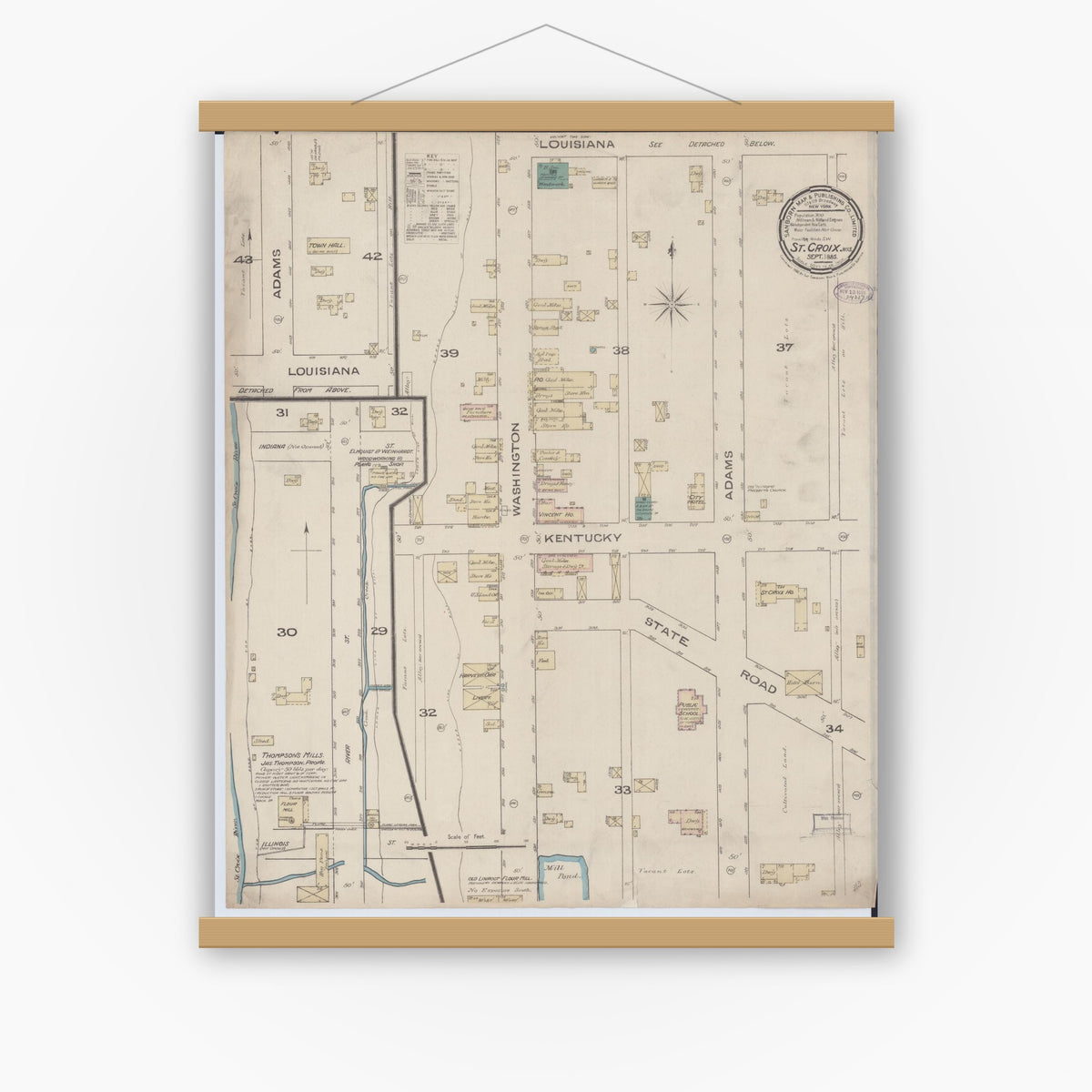 Old map wall art mockup — magnetic wood frame on white wall — Sanborn Fire Insurance Map from Saint Croix Falls, Polk County, Wisconsin (1885), Sheet #0001