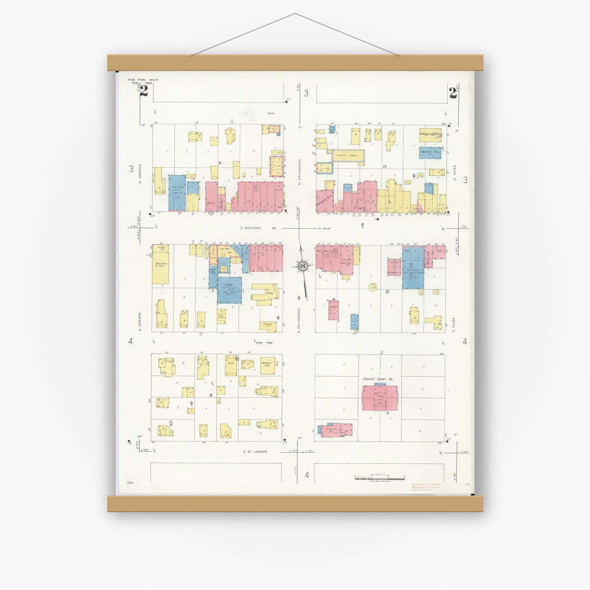 Old map wall art mockup — magnetic wood frame on white wall — Sanborn Fire Insurance Map from Paw Paw, Van Buren County, Michigan (1934), Sheet #0002