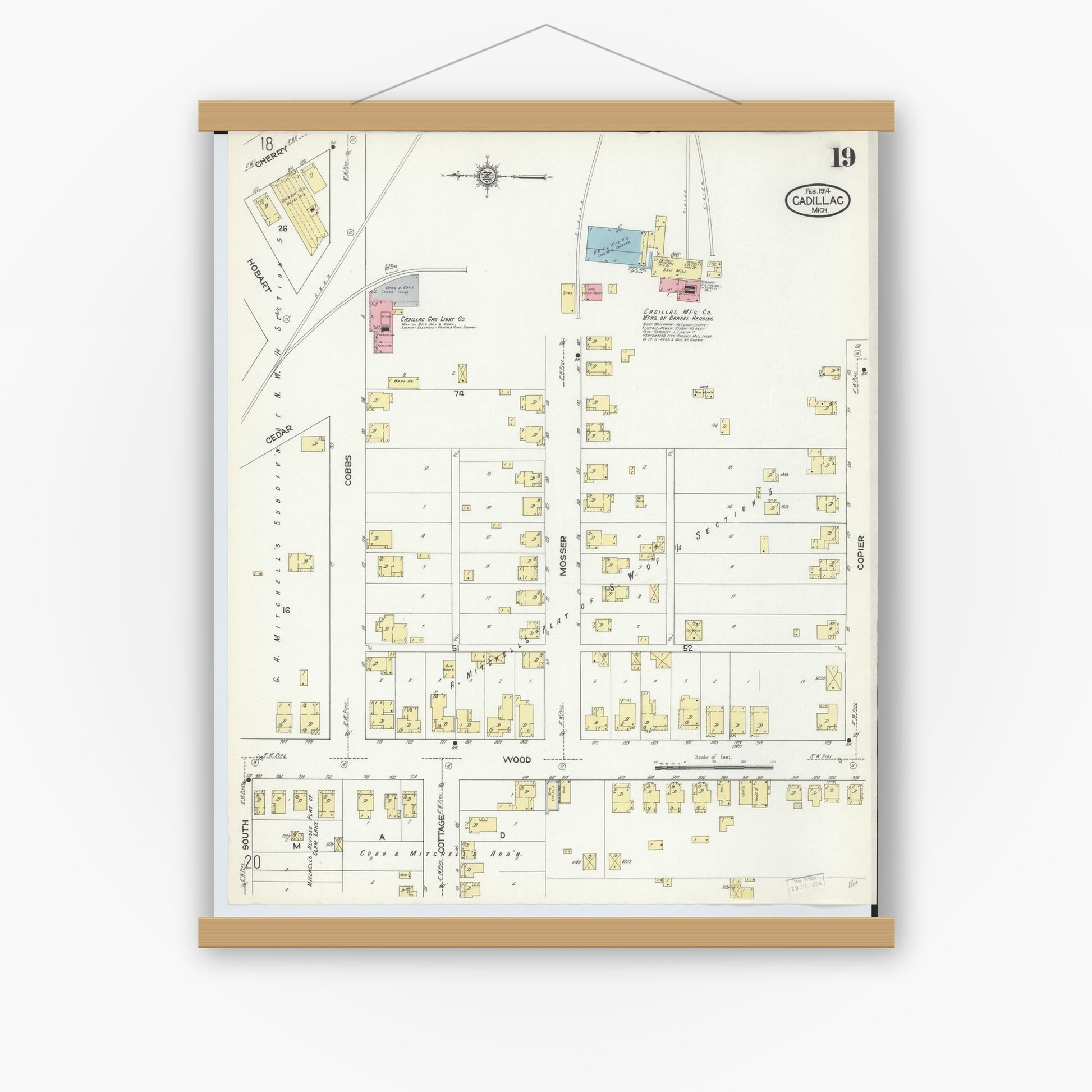 Old map wall art mockup — magnetic wood frame on white wall — Sanborn Fire Insurance Map from Cadillac, Wexford County, Michigan (1914), Sheet #0019