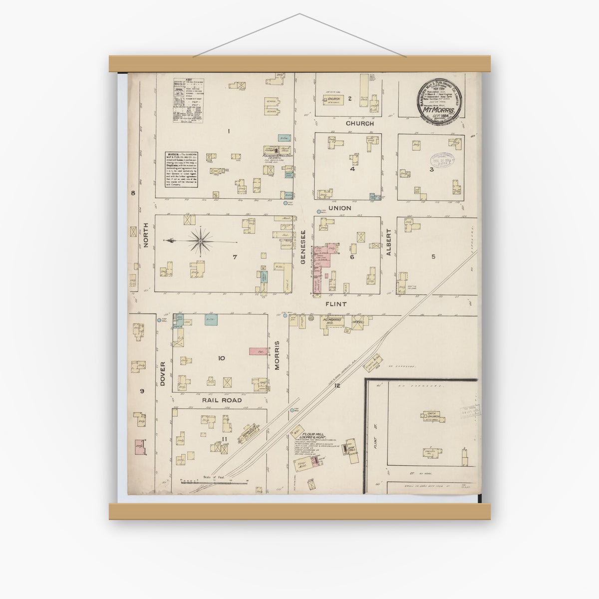 Old map wall art mockup — magnetic wood frame on white wall — Sanborn Fire Insurance Map from Mount Morris, Genesee County, Michigan (1884), Sheet #0001