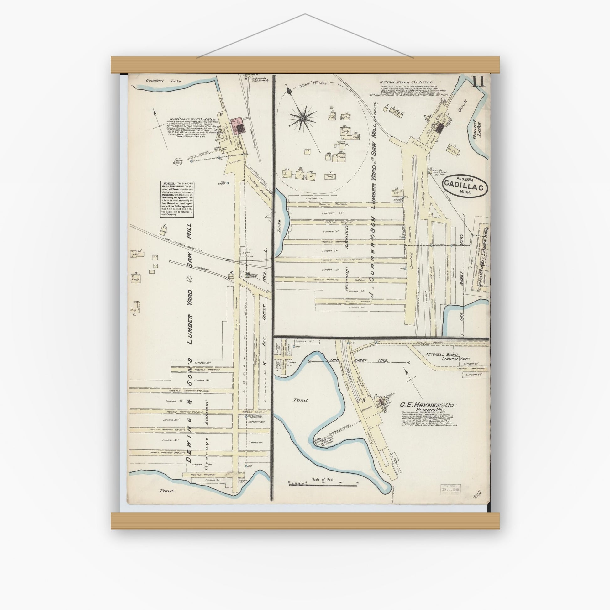Old map wall art mockup — magnetic wood frame on white wall — Sanborn Fire Insurance Map from Cadillac, Wexford County, Michigan (1884), Sheet #0011