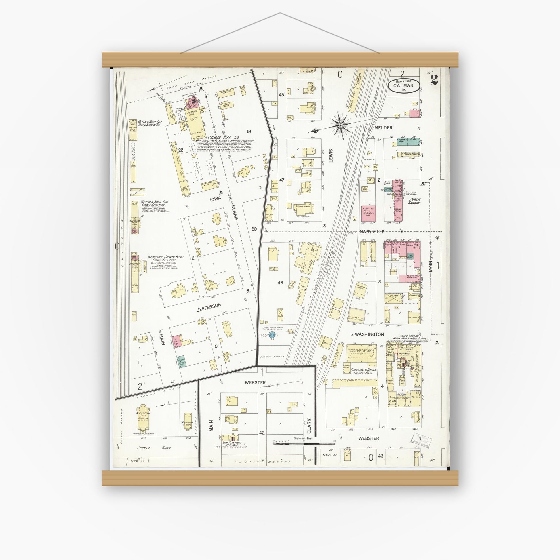 Old map wall art mockup — magnetic wood frame on white wall — Sanborn Fire Insurance Map from Calmar, Winneshiek County, Iowa (1902), Sheet #0002