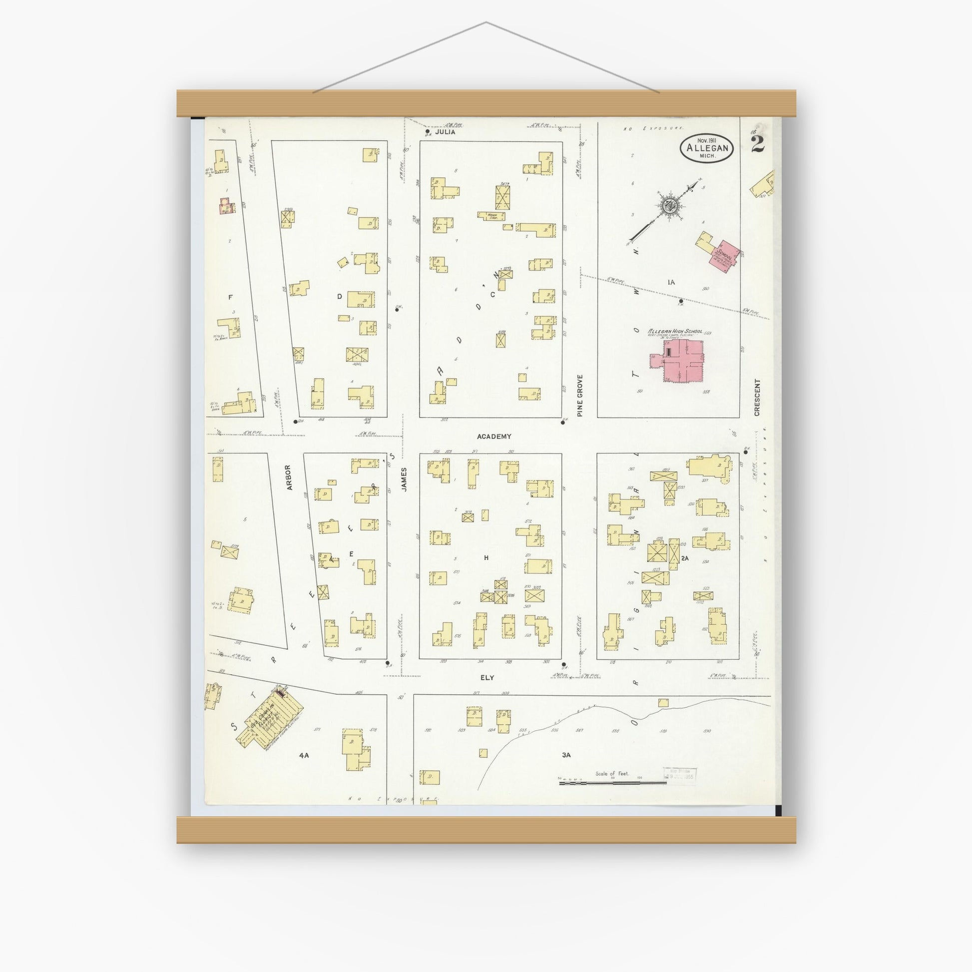 Old map wall art mockup — magnetic wood frame on white wall — Sanborn Fire Insurance Map from Allegan, Allegan County, Michigan (1911), Sheet #0002