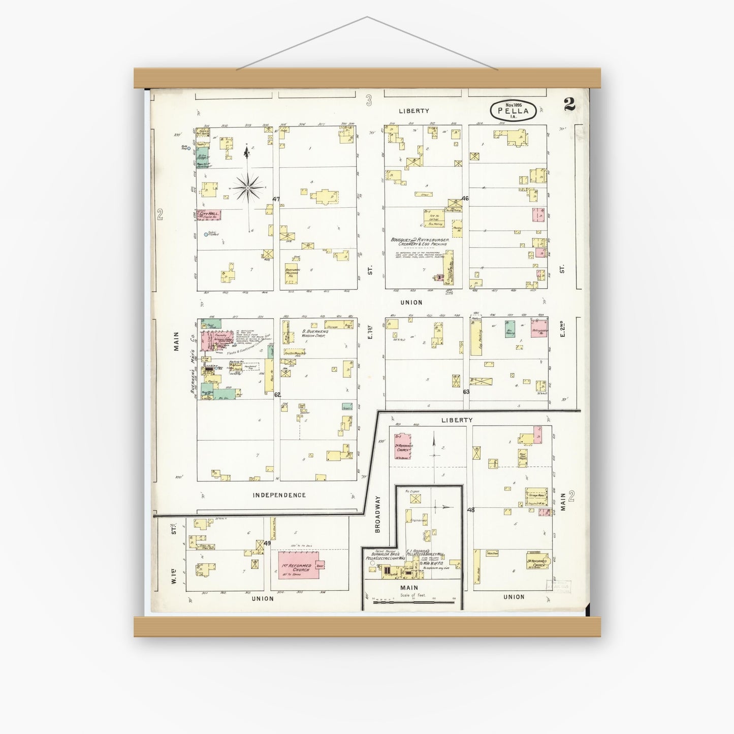 Old map wall art mockup — magnetic wood frame on white wall — Sanborn Fire Insurance Map from Pella, Marion County, Iowa (1895), Sheet #0002