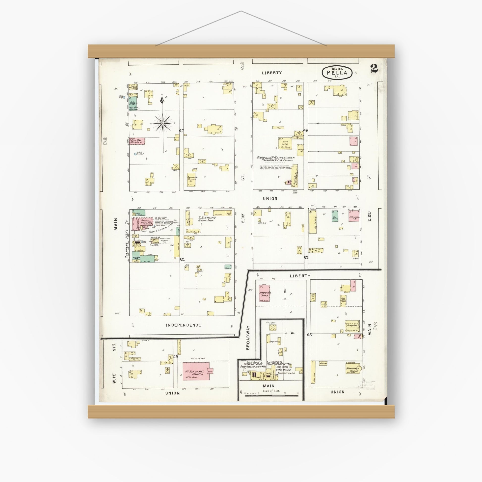 Old map wall art mockup — magnetic wood frame on white wall — Sanborn Fire Insurance Map from Pella, Marion County, Iowa (1895), Sheet #0002