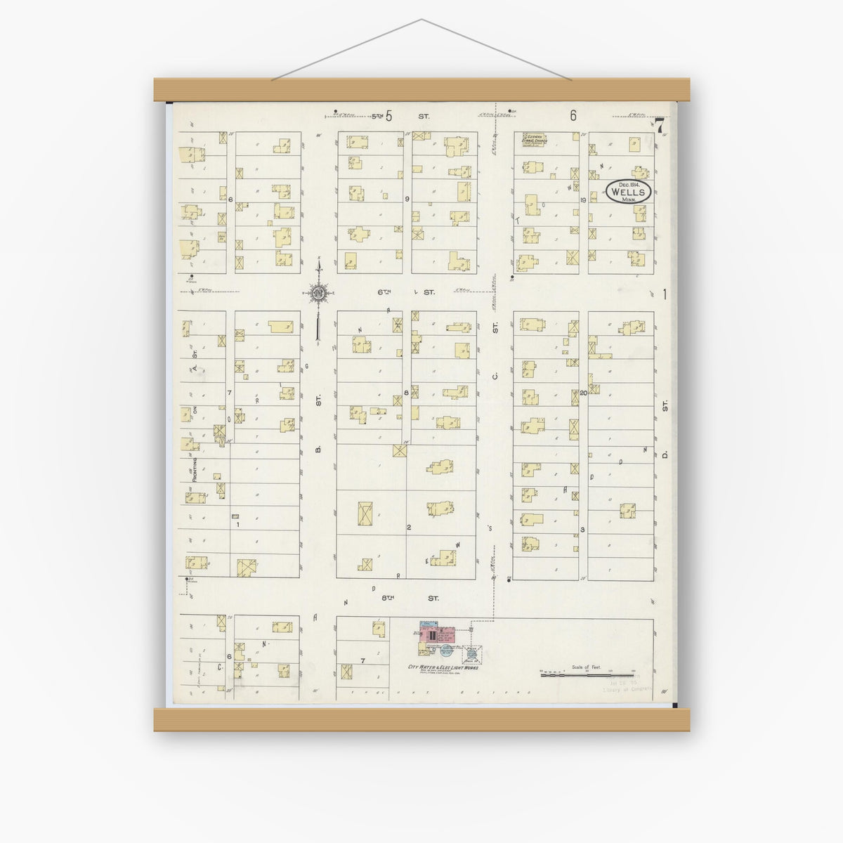 Old map wall art mockup — magnetic wood frame on white wall — Sanborn Fire Insurance Map from Wells, Faribault County, Minnesota (1914), Sheet #0007
