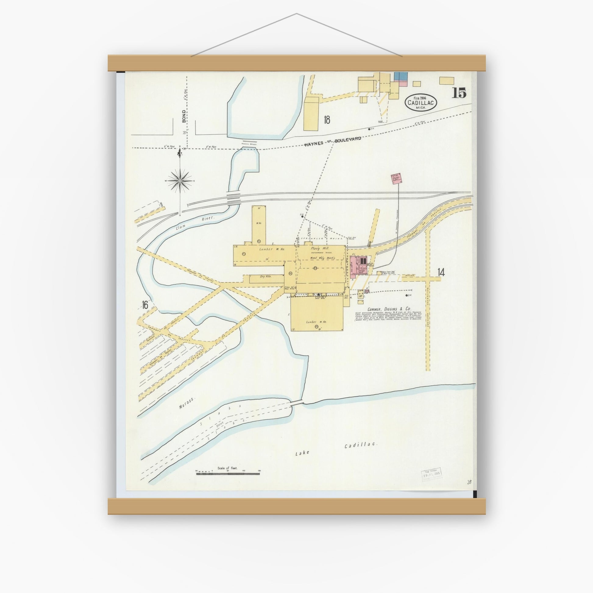 Old map wall art mockup — magnetic wood frame on white wall — Sanborn Fire Insurance Map from Cadillac, Wexford County, Michigan (1906), Sheet #0015