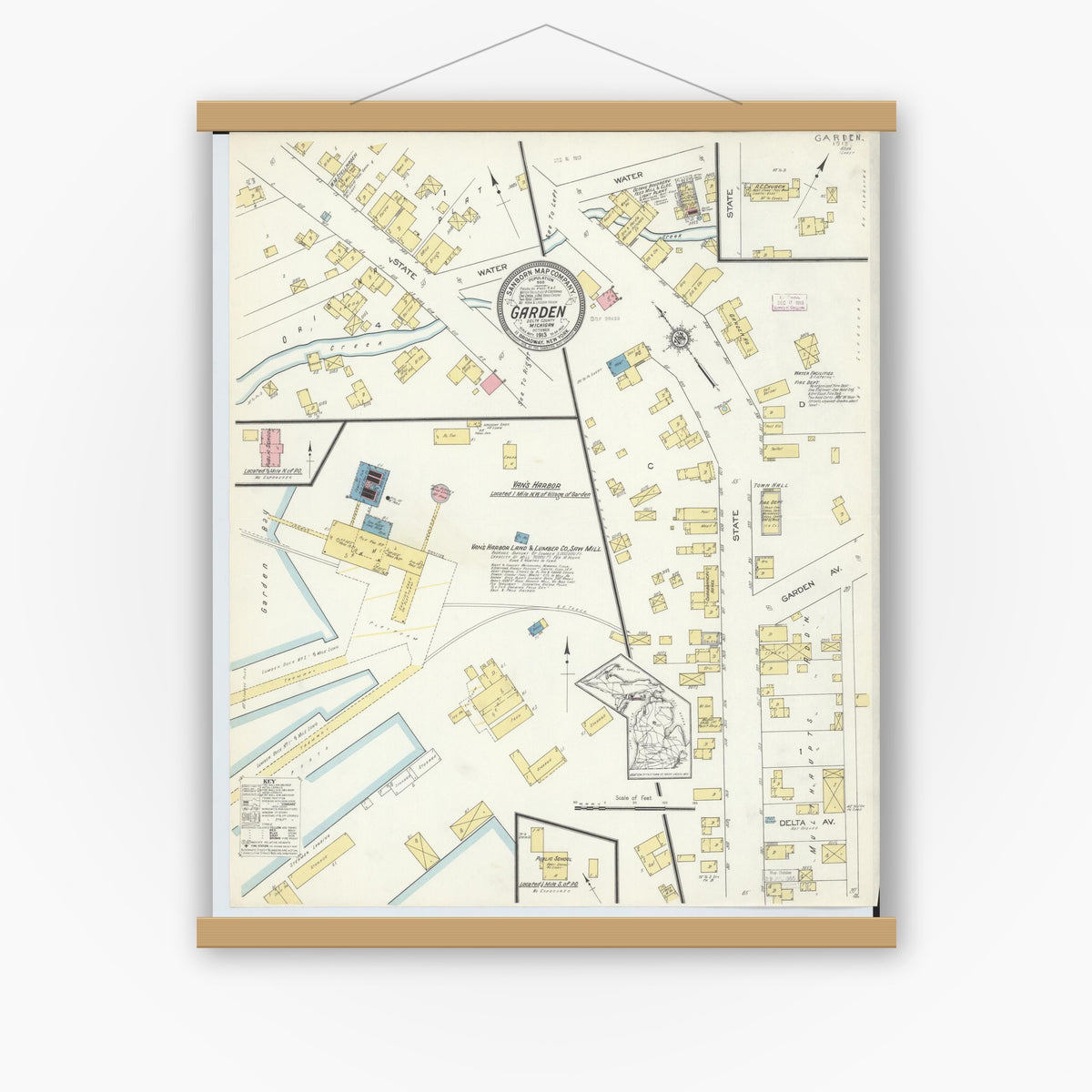 Old map wall art mockup — magnetic wood frame on white wall — Sanborn Fire Insurance Map from Garden, Delta County, Michigan (1913), Sheet #0001