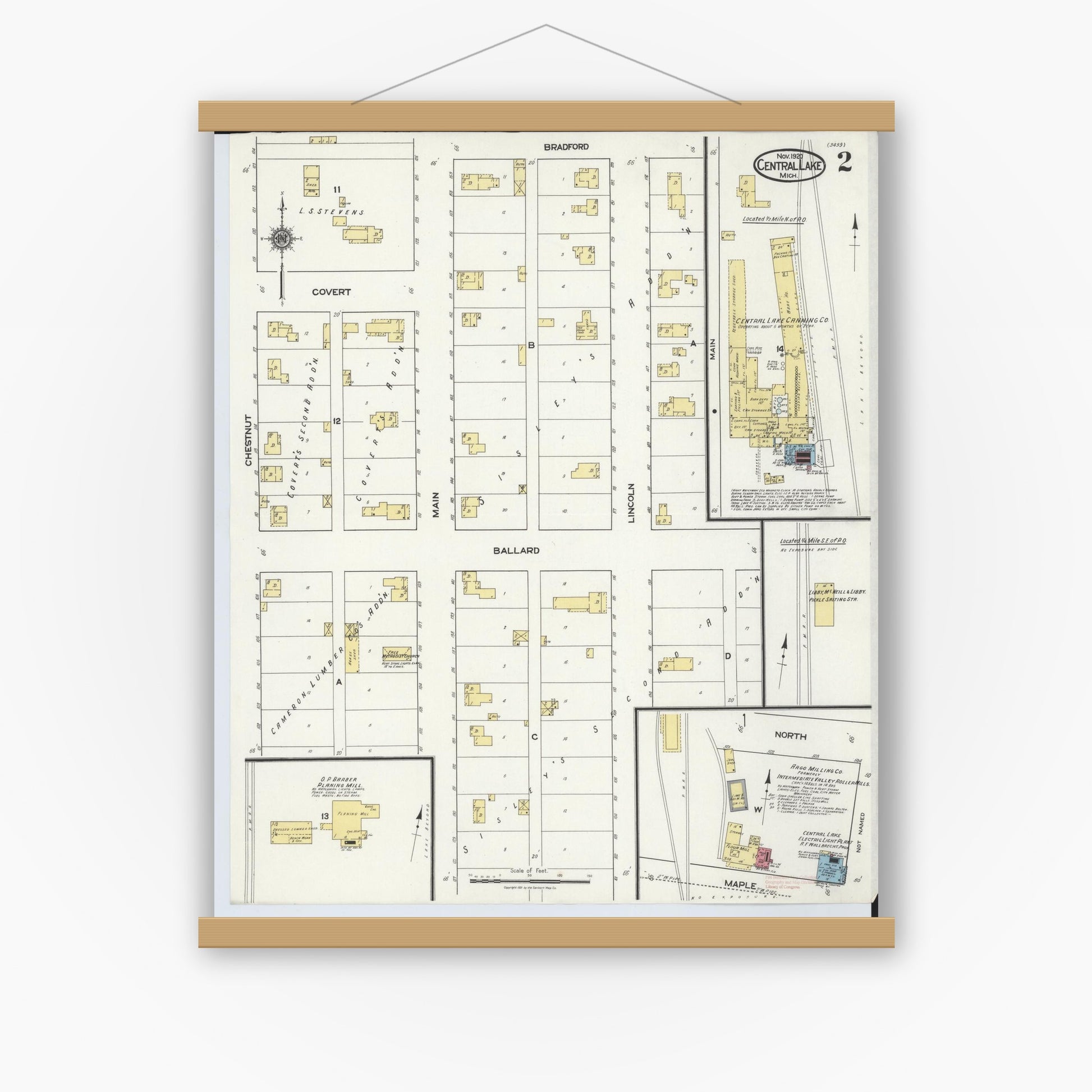 Old map wall art mockup — magnetic wood frame on white wall — Sanborn Fire Insurance Map from Central Lake, Antrim County, Michigan (1920), Sheet #0002