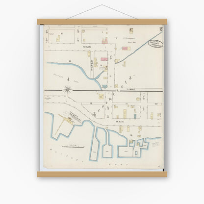 Old map wall art mockup — magnetic wood frame on white wall — Sanborn Fire Insurance Map from Onekama, Manistee County, Michigan (1885), Sheet #0002