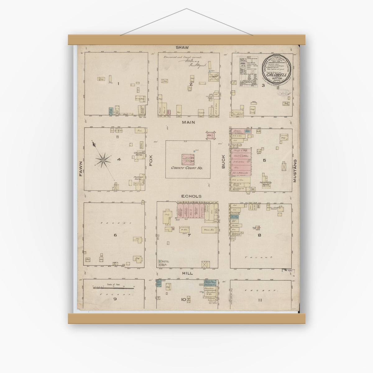 Old map wall art mockup — magnetic wood frame on white wall — Sanborn Fire Insurance Map from Caldwell, Burleson County, Texas (1885), Sheet #0001