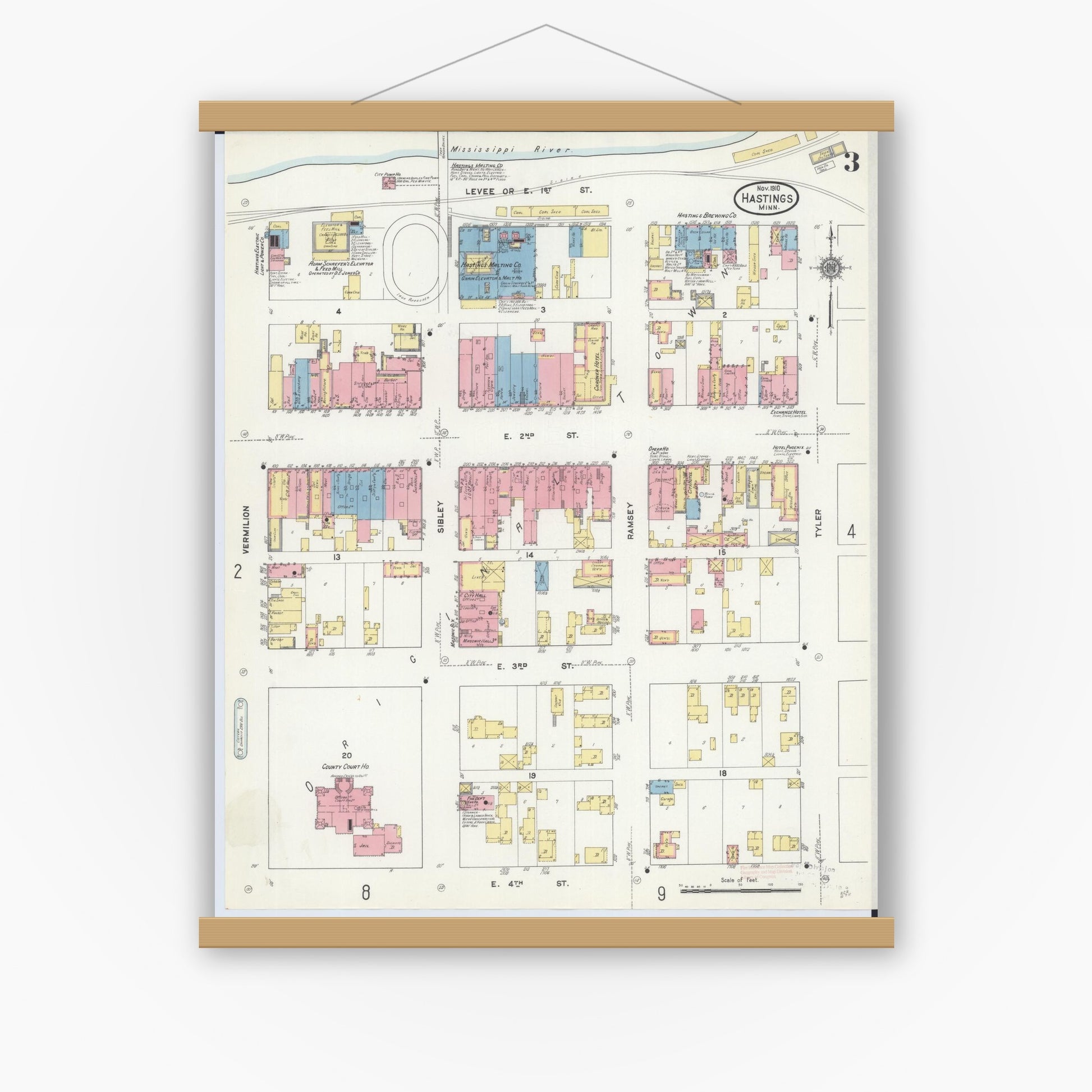 Old map wall art mockup — magnetic wood frame on white wall — Sanborn Fire Insurance Map from Hastings, Dakota County, Minnesota (1910), Sheet #0003