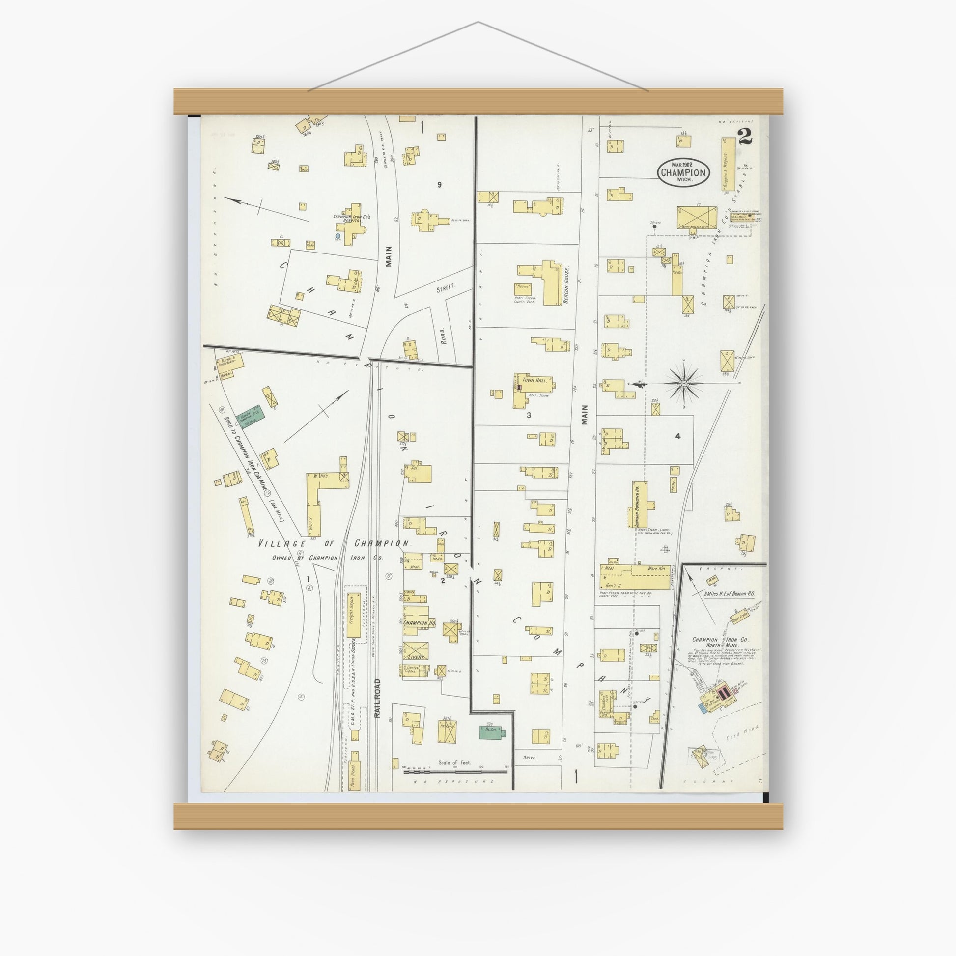 Old map wall art mockup — magnetic wood frame on white wall — Sanborn Fire Insurance Map from Champion, Marquette County, Michigan (1902), Sheet #0002
