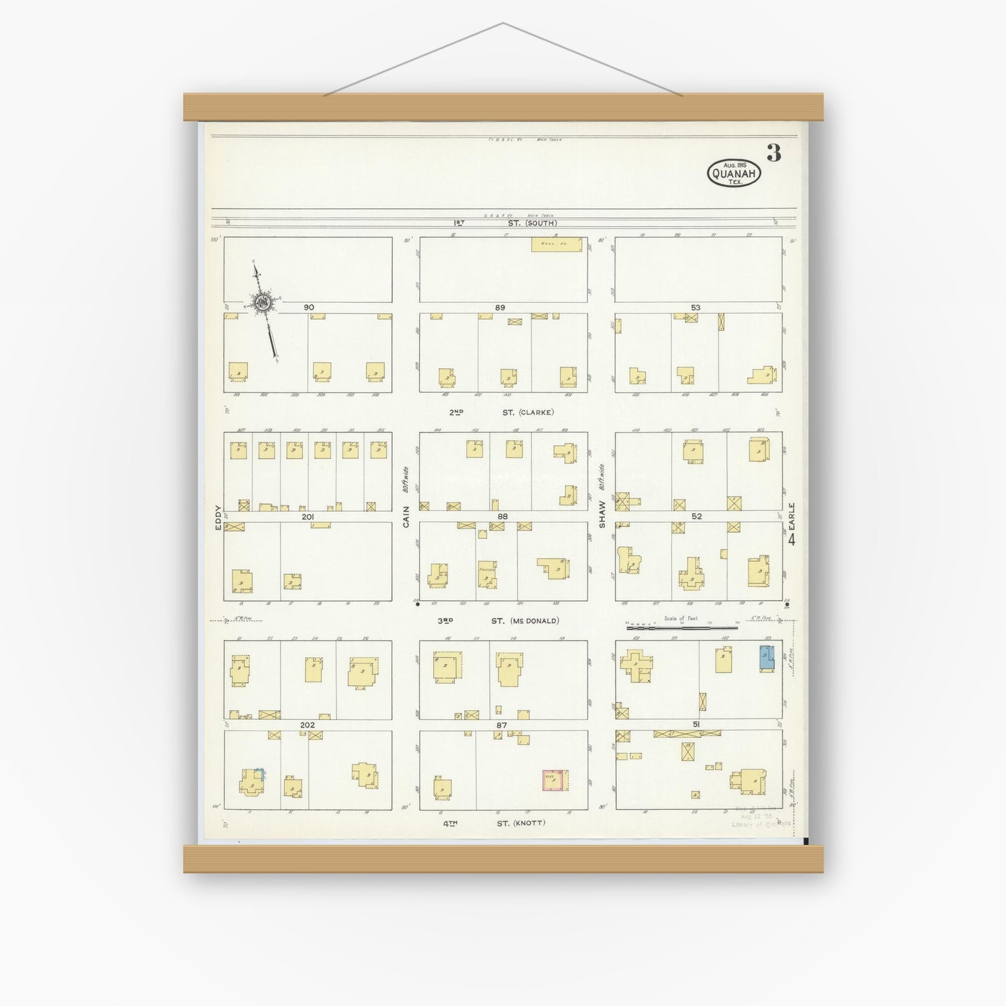Old map wall art mockup — magnetic wood frame on white wall — Sanborn Fire Insurance Map from Quanah, Hardeman County, Texas (1915), Sheet #0003