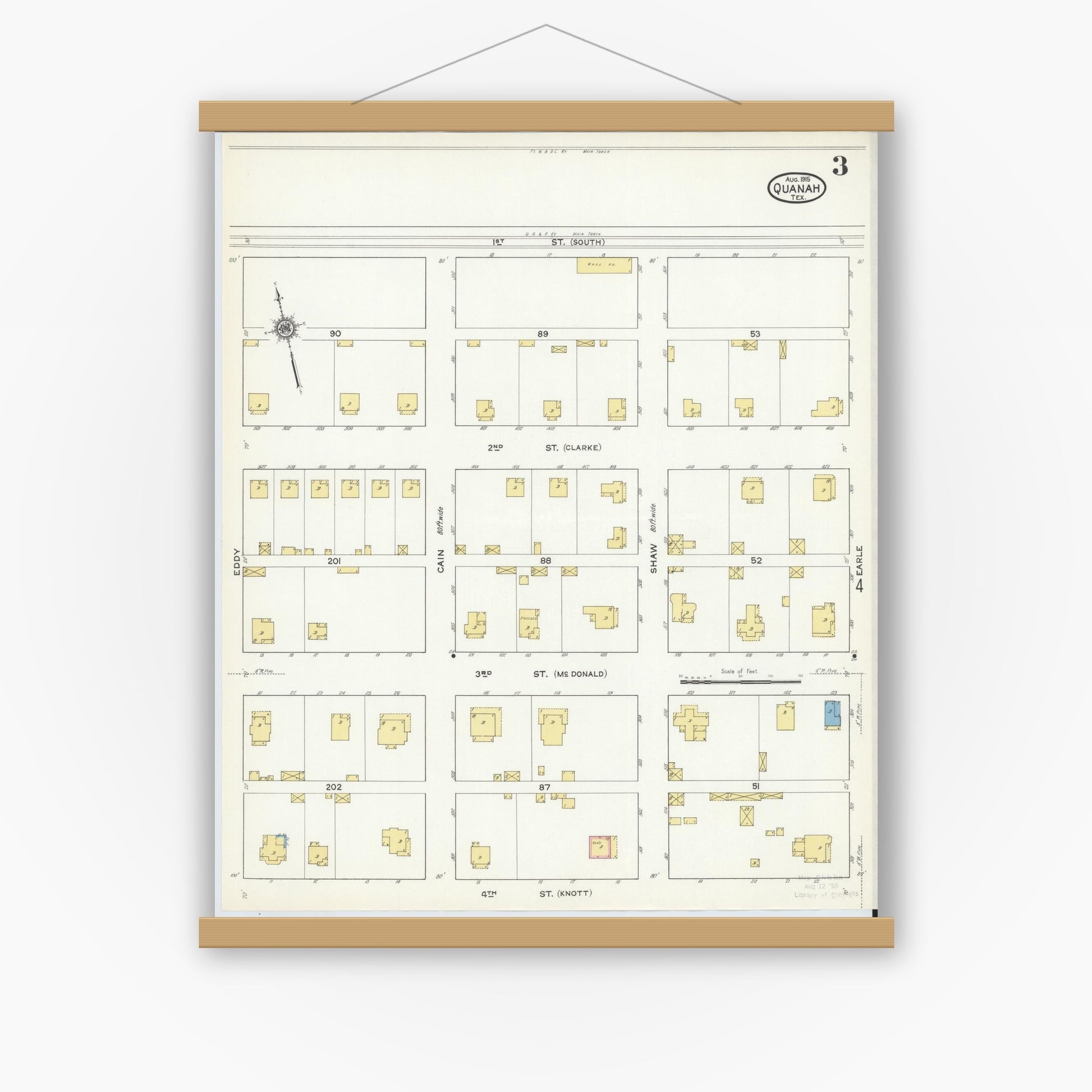 Old map wall art mockup — magnetic wood frame on white wall — Sanborn Fire Insurance Map from Quanah, Hardeman County, Texas (1915), Sheet #0003