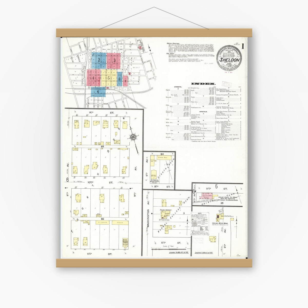 Old map wall art mockup — magnetic wood frame on white wall — Sanborn Fire Insurance Map from Sheldon, O'Brien County, Iowa (1909) â€” Complete Set