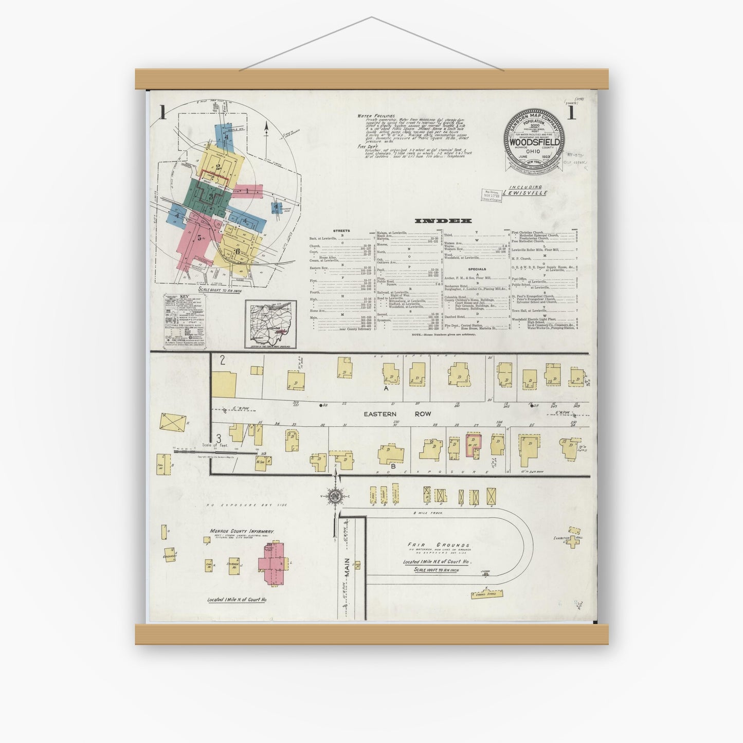 Old map wall art mockup — magnetic wood frame on white wall — Sanborn Fire Insurance Map from Woodsfield, Monroe County, Ohio (1923) - Complete Map Set