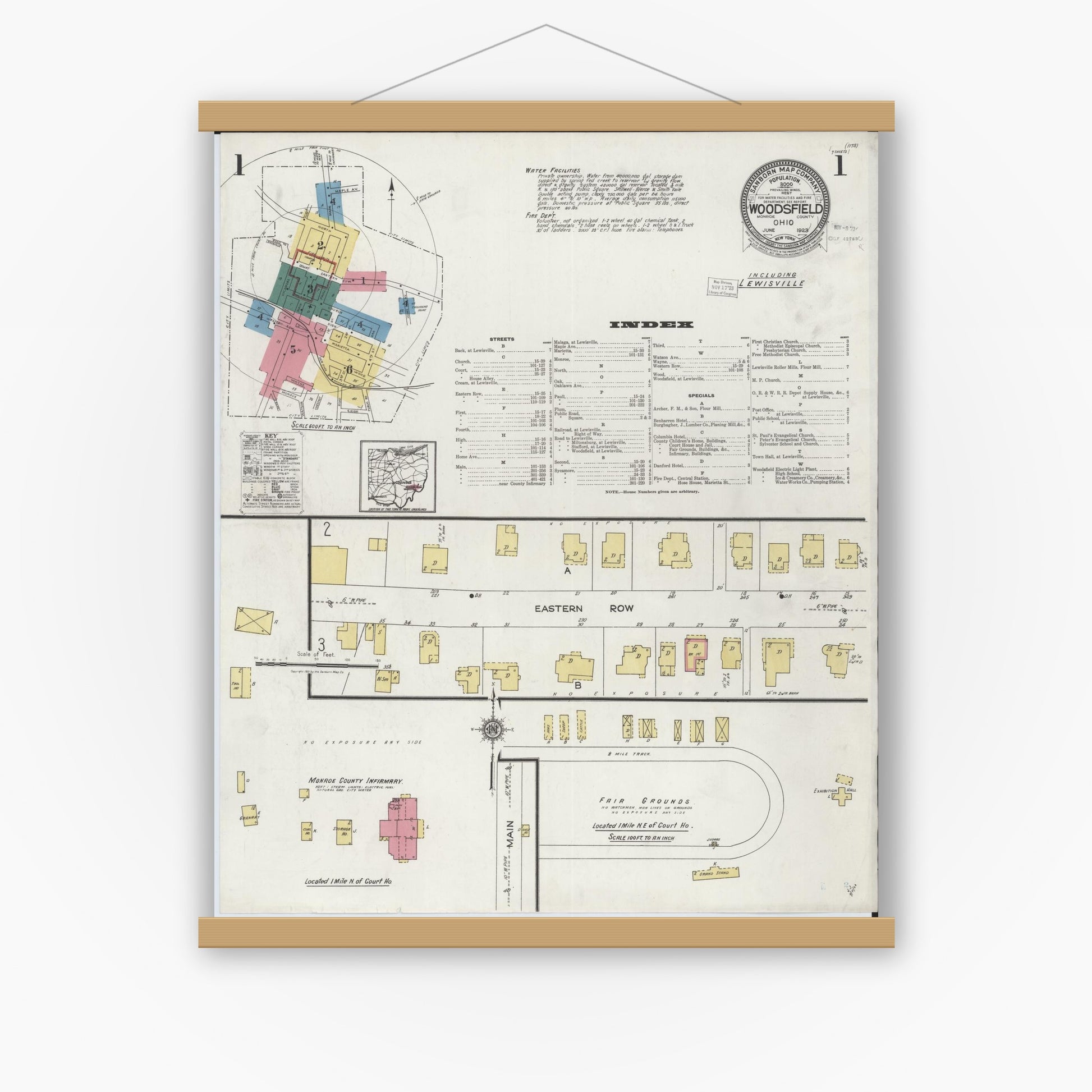 Old map wall art mockup — magnetic wood frame on white wall — Sanborn Fire Insurance Map from Woodsfield, Monroe County, Ohio (1923) - Complete Map Set