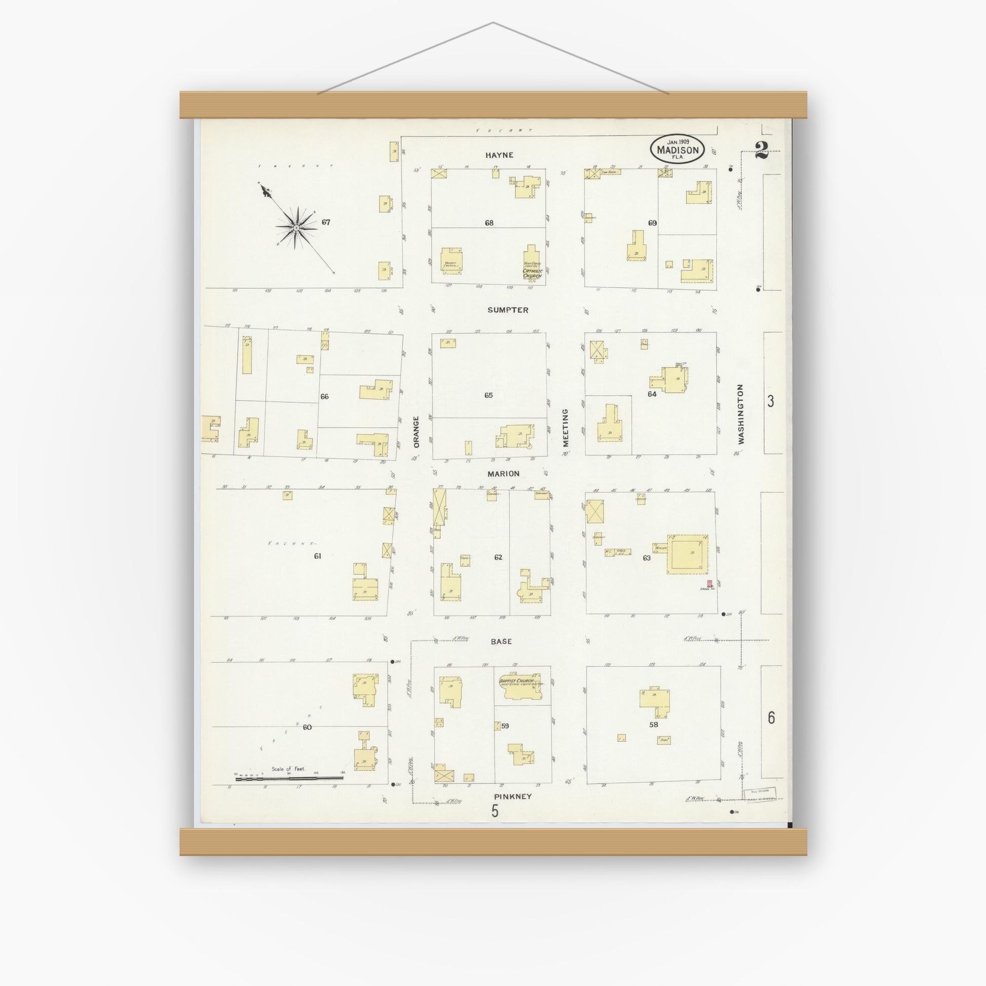 Old map wall art mockup — magnetic wood frame on white wall — Sanborn Fire Insurance Map from Madison, Madison County, Florida (1909), Sheet #0002