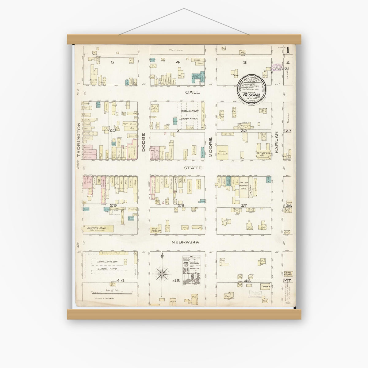 Old map wall art mockup — magnetic wood frame on white wall — Sanborn Fire Insurance Map from Algona, Kossuth County, Iowa (1885) â€” Complete Set